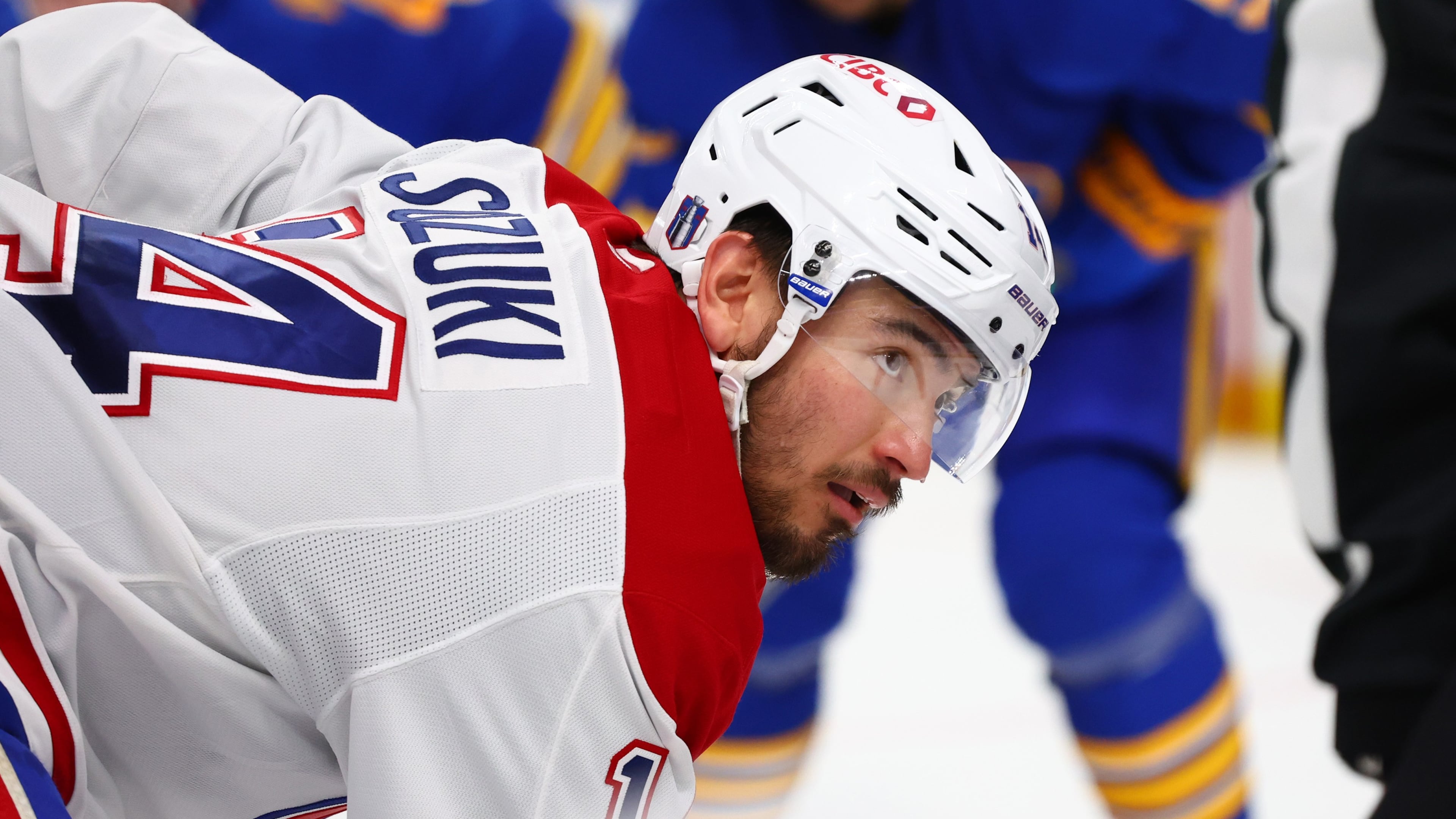 Montreal Canadiens center Nick Suzuki lines up for a face-off during the second period in Game 5 of a second-round NHL hockey Stanley Cup playoff series against the Buffalo Sabres, Thursday, May 14, 2026, in Buffalo, N.Y. (AP Photo/Jeffrey T. Barnes)