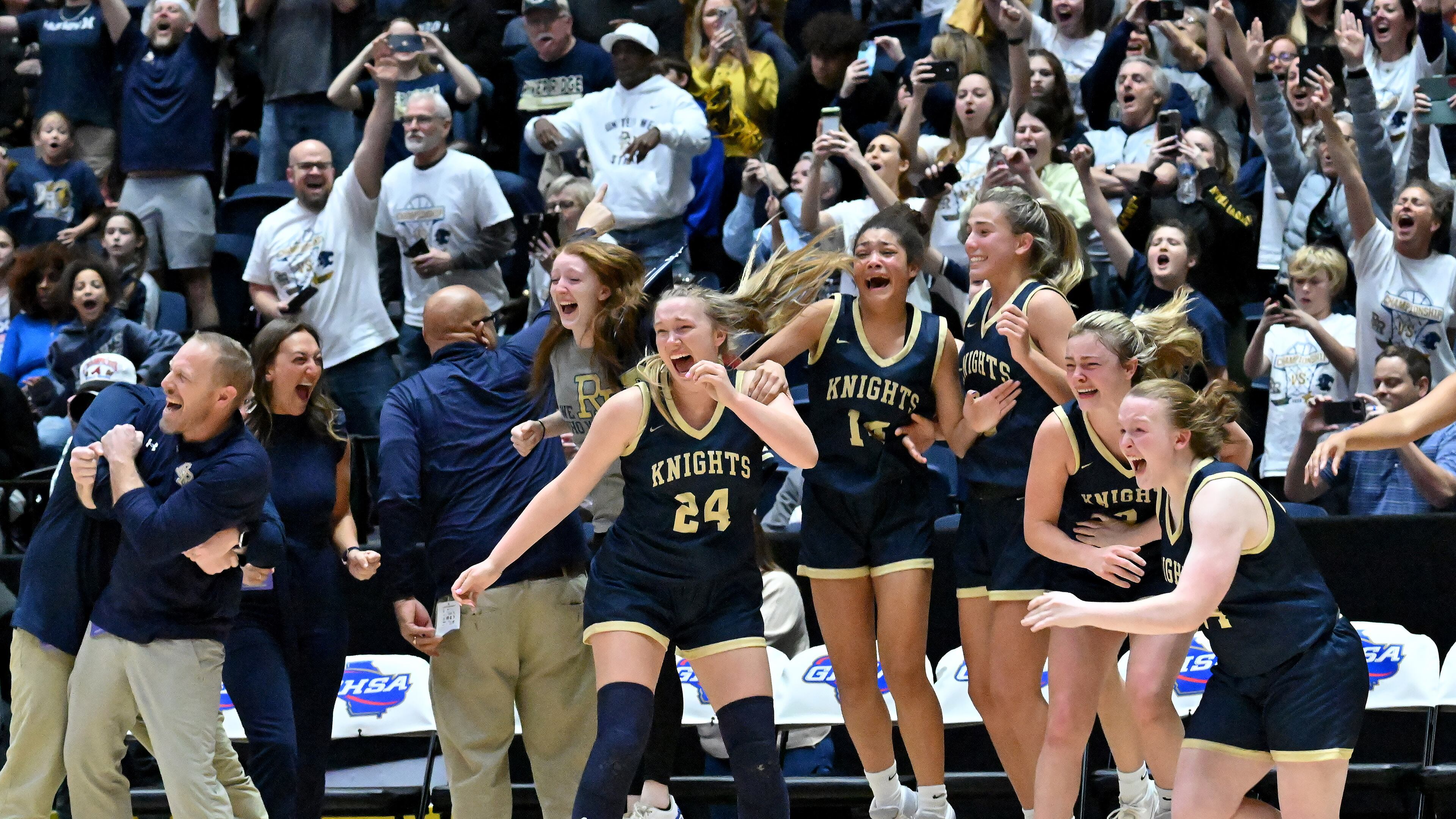 River Ridge players celebrate after winning the Class 6A state championship Friday in Macon.