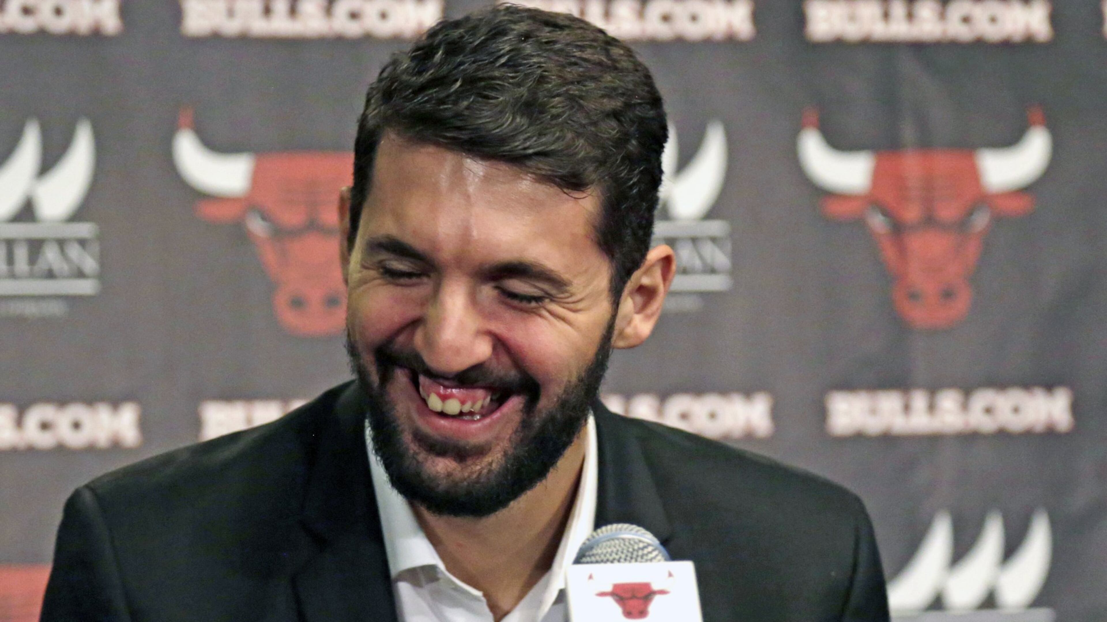 New Bulls forward Nikola Mirotic laughs at his introductory news conference in Chicago. He is a key addition for Chicago, in addition to Pau Gasol and rookie Doug McDermott. (AP Photo/M. Spencer Green)
