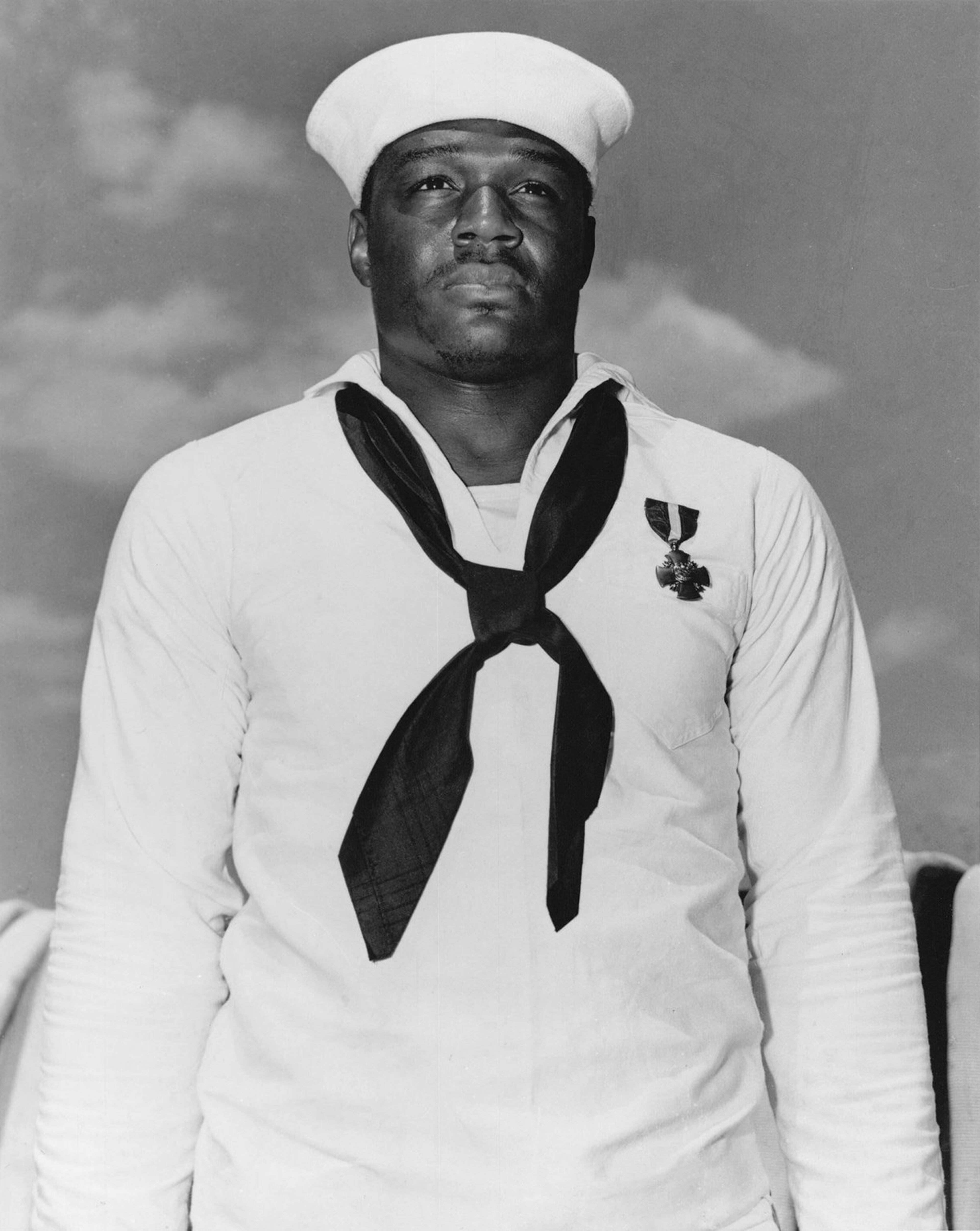 Doris Miller was awarded the Navy Cross on May 27, 1942 for his bravery during the Pearl Harbor attack. Miller manned an anti-aircraft machine gun during the battle, despite having no training, and helped the injured. (U.S. Naval History and Heritage Command)