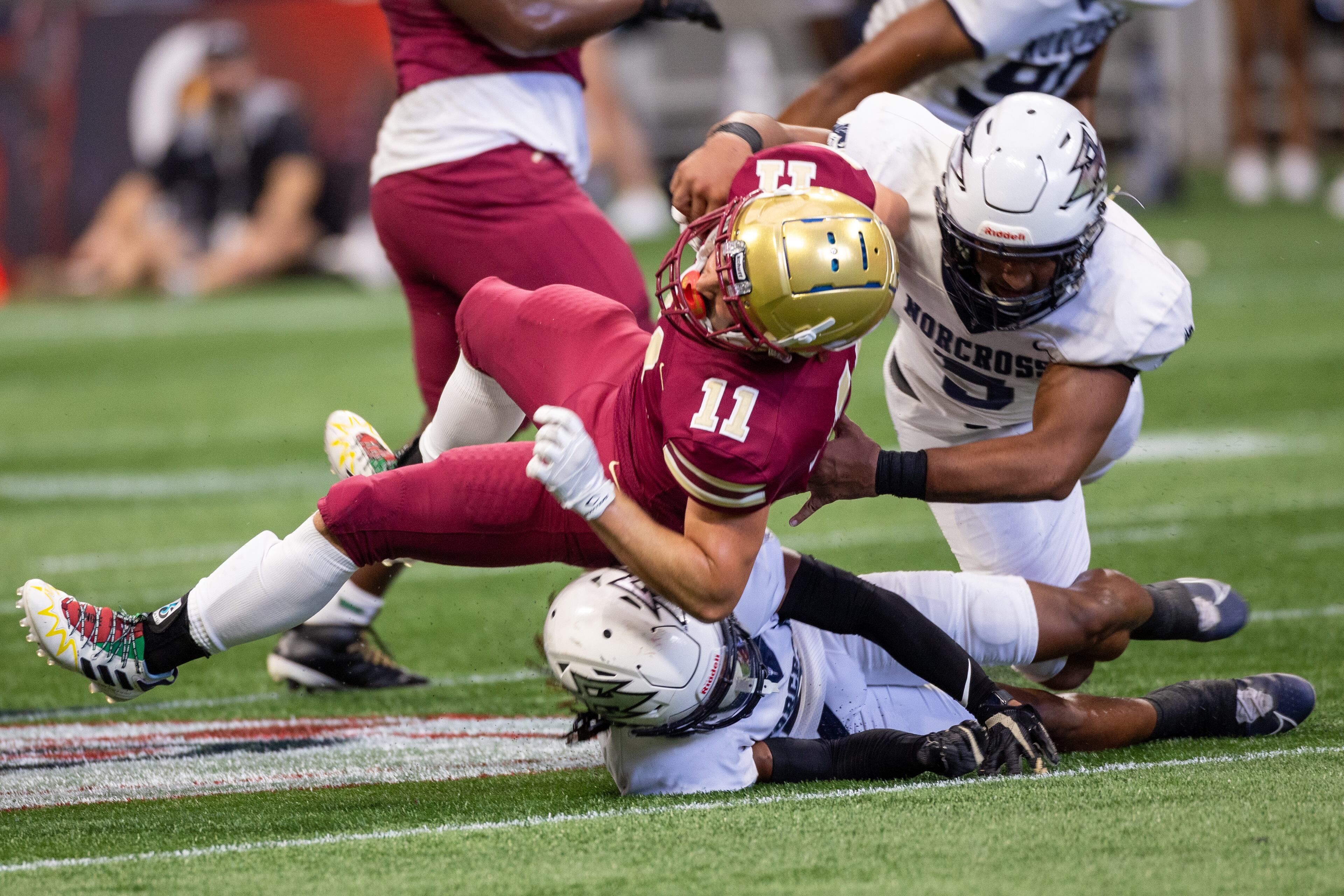 Brookwood High School WR Miles Massengill is brought down by the Norcross defense during the Corky Kell Classic at the Mercedes Bens Stadium Saturday, August 20, 2022. Steve Schaefer/steve.schaefer@ajc.com)
