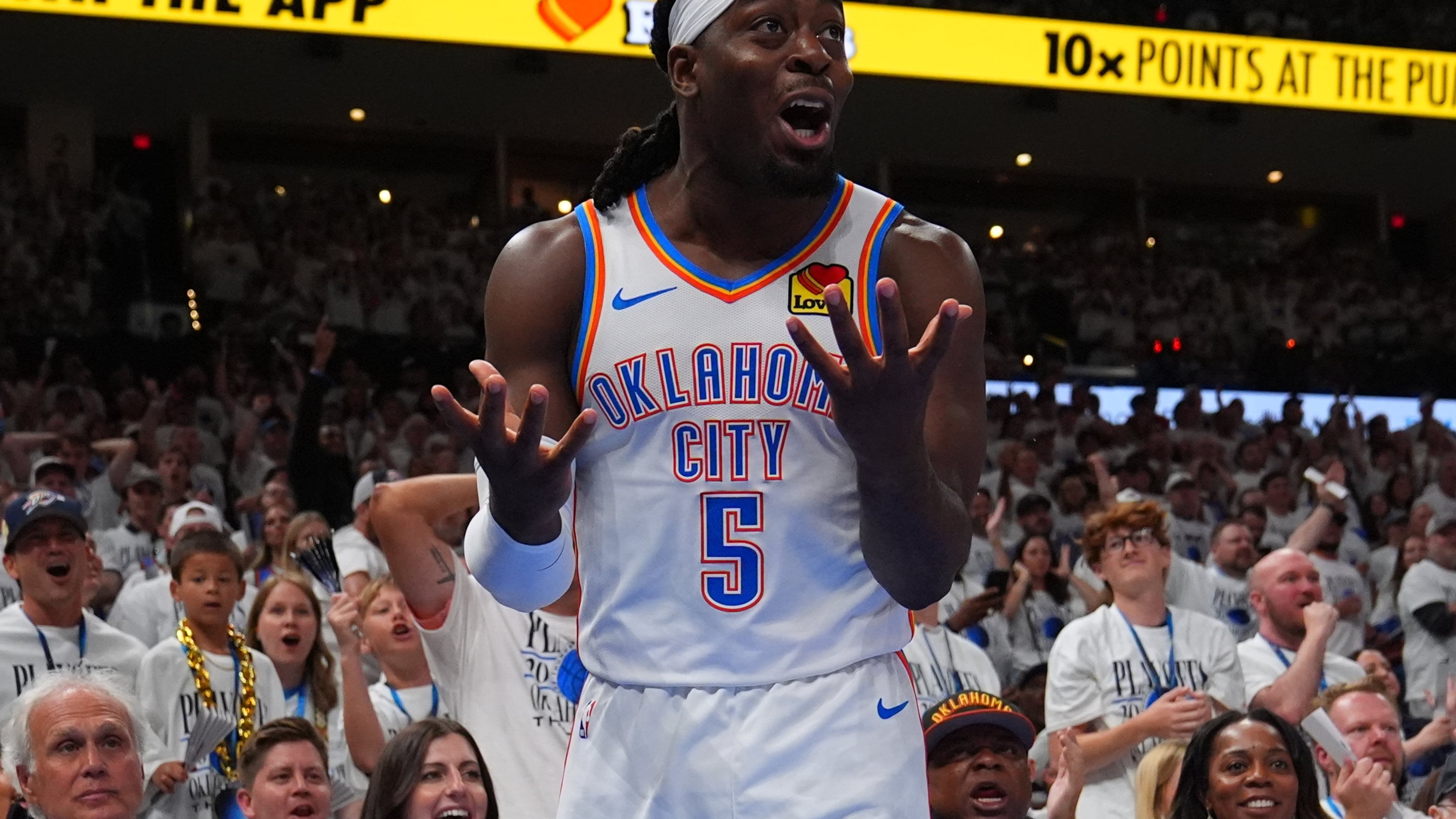 Oklahoma City Thunder guard Luguentz Dort (5) reacts to a foul in the second half of Game 5 in the Western Conference finals NBA basketball playoffs series against the San Antonio Spurs, Tuesday, May 26, 2026, in Oklahoma City. (AP Photo/Julio Cortez)