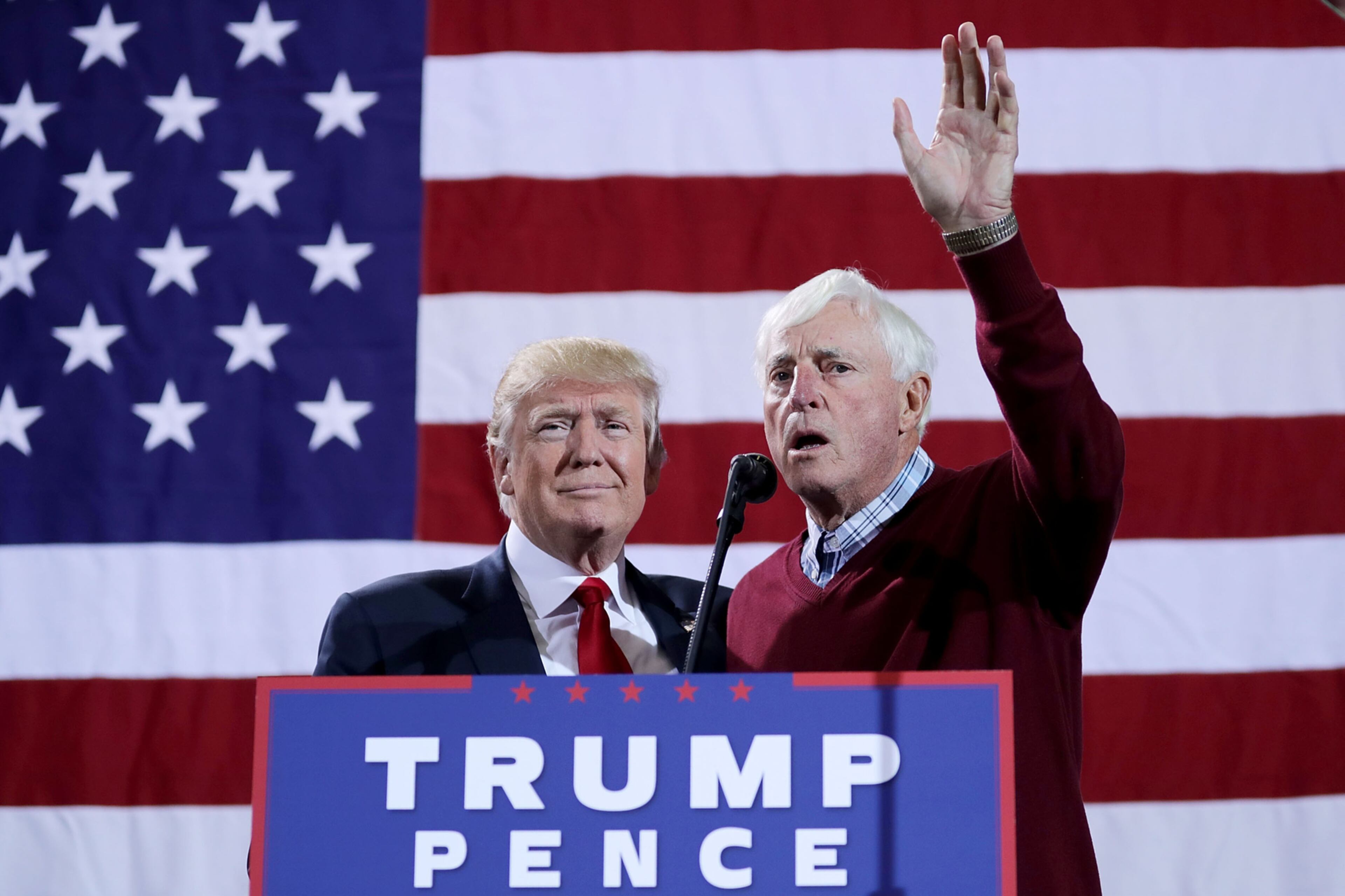 GRAND RAPIDS, MI - OCTOBER 31: Republican presidential nominee Donald Trump (L) is introduced by former Indiana University basketball coach Bobby Knight during a campaign rally at the Deltaplex Arena October 31, 2016 in Grand Rapids, Michigan. With just eight days until the election, polls show a slight tightening in the race. (Photo by Chip Somodevilla/Getty Images) *** BESTPIX ***