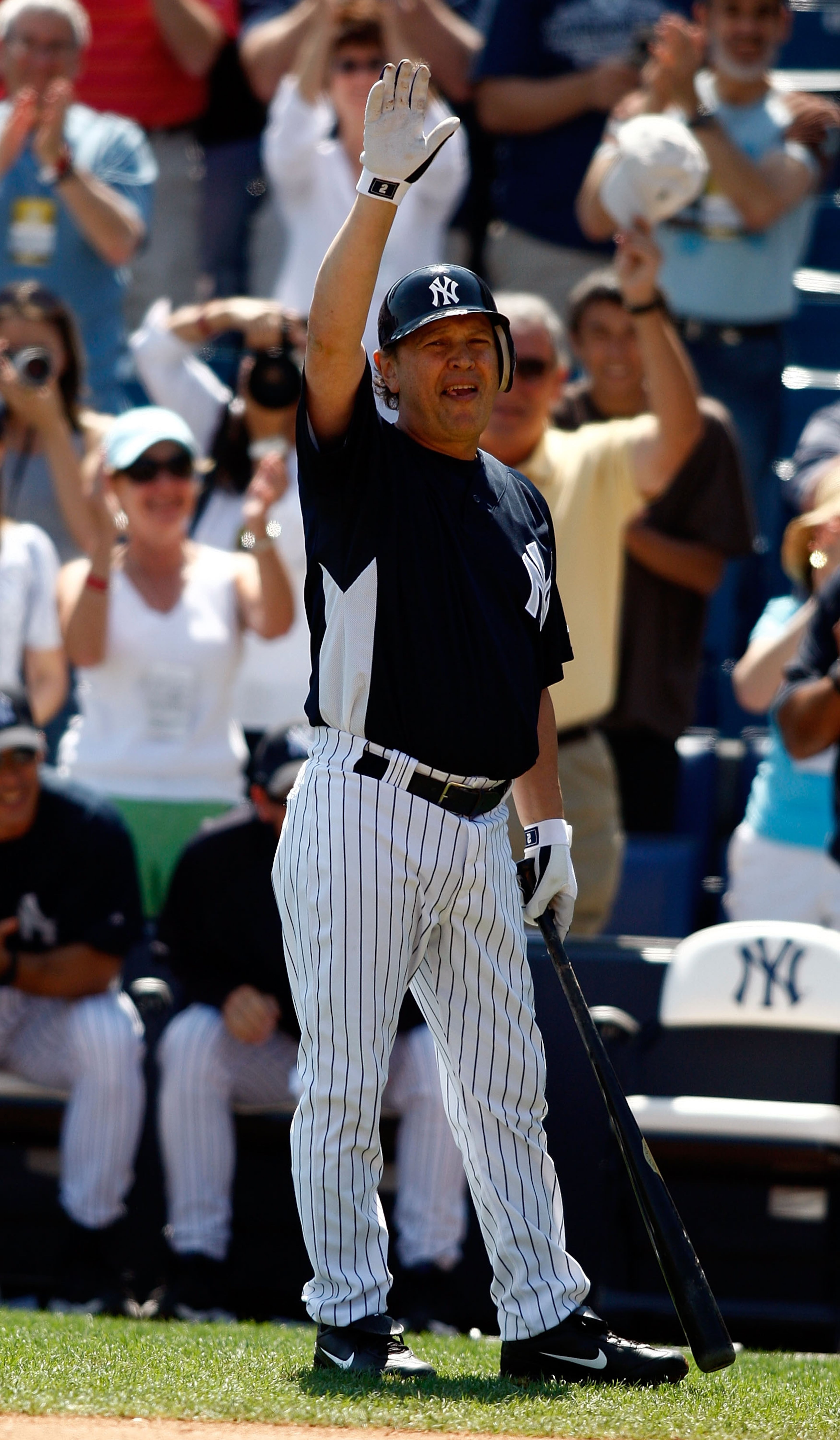 Billy Crystal #60 of the New York Yankees acknowledges the crowd against the Pittsburgh Pirates during the Grapefruit League Spring Training game on March 13, 2008 at Legends Field in Tampa, Florida. (Photo by J. Meric/Getty Images)