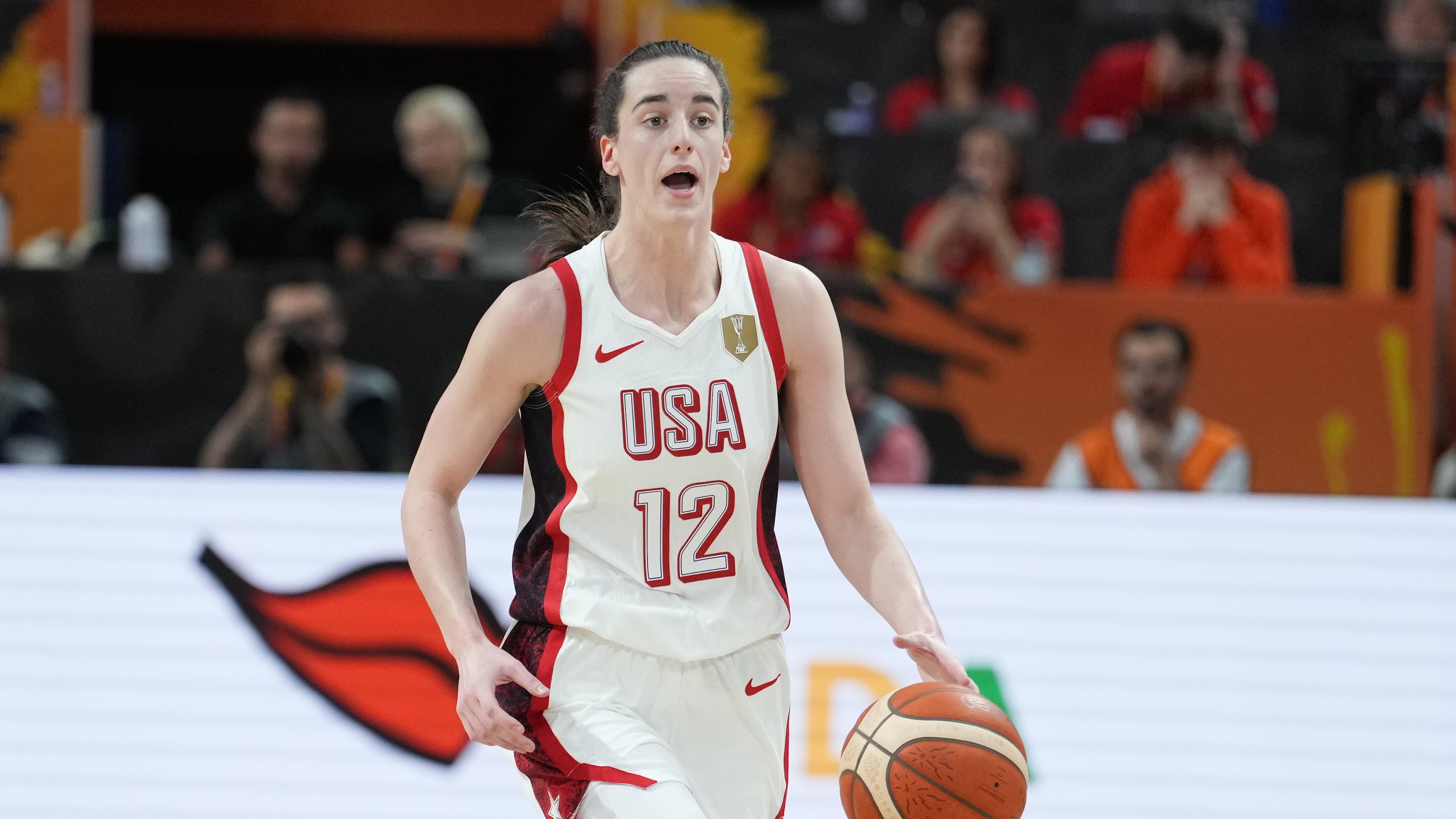 United States' Caitlin Clark dribbles during the Women's Basketball World Cup match between China and the United States in Berlin, Friday, Sept. 4, 2026. (AP Photo/Ebrahim Noroozi)