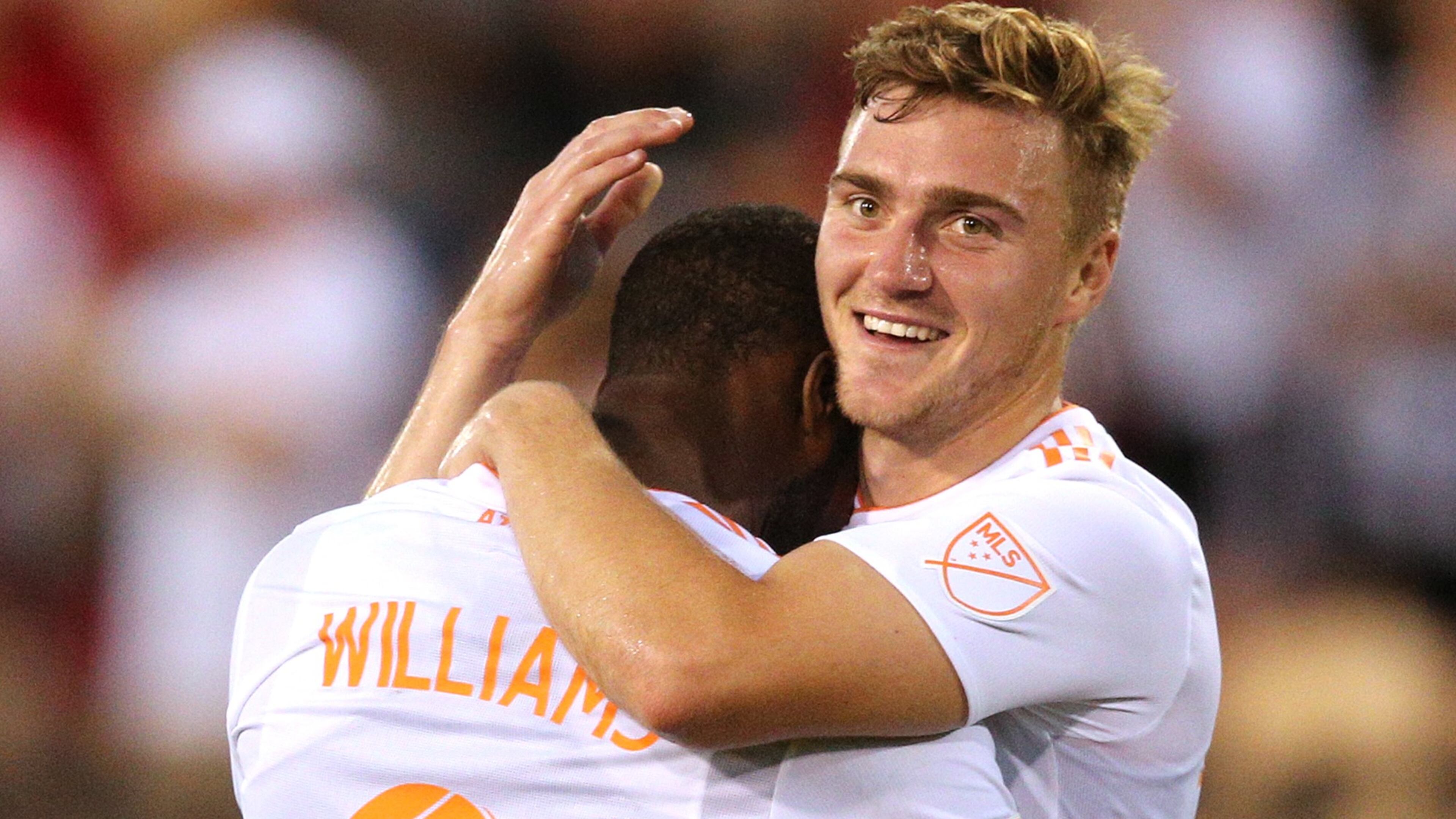 Atlanta United forward Romario Williams (left) celebrates his goal with midfielder Julian Gressel against Charleston Battery during the second half in a U.S. Open Cup match on Wednesday, June 6, 2018, in Kennesaw. Curtis Compton/ccompton@ajc.com
