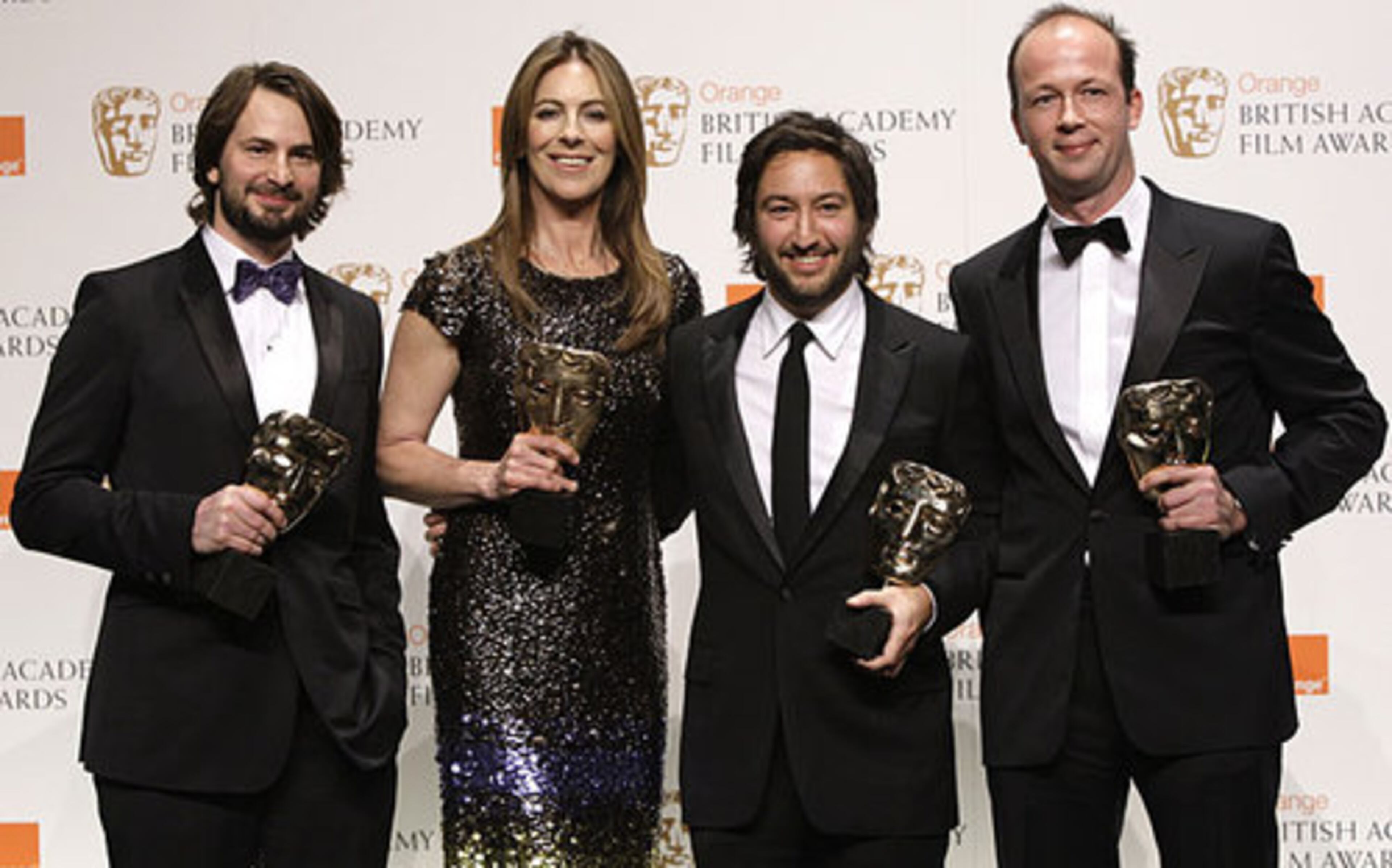 From left to right, U.S. screeenwriter Mark Boal, U.S. director Kathryn Bigelow, producer Greg Shapiro and French Nicolas Chartier, pose for the photographers with their awards for Best Film for "The Hurt Locker."