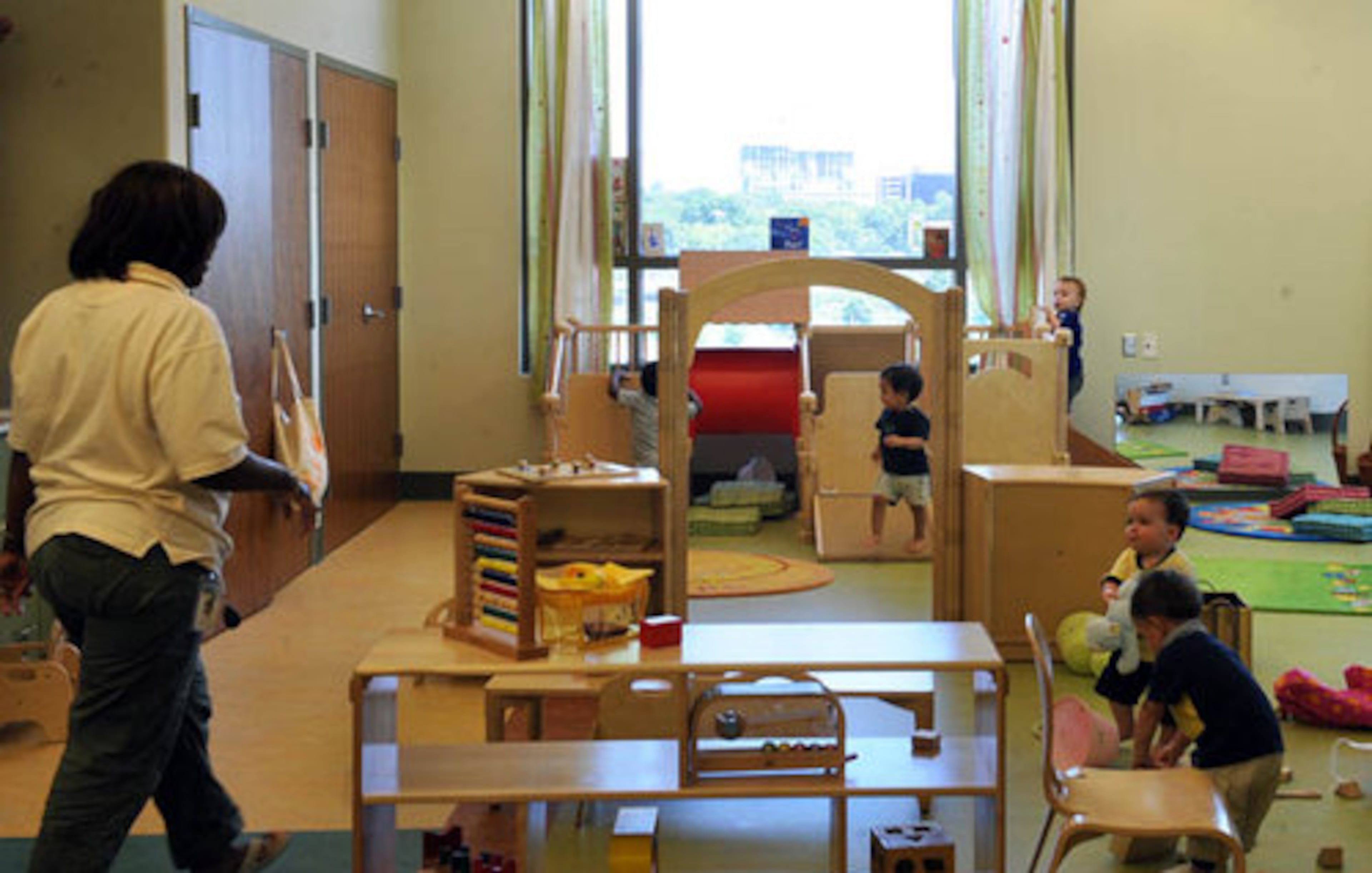 The center's lighting includes dragon fly pendant lighting and skylights. Decorative boxes hold inspirational phrases such as "Every artist was first an amateur."