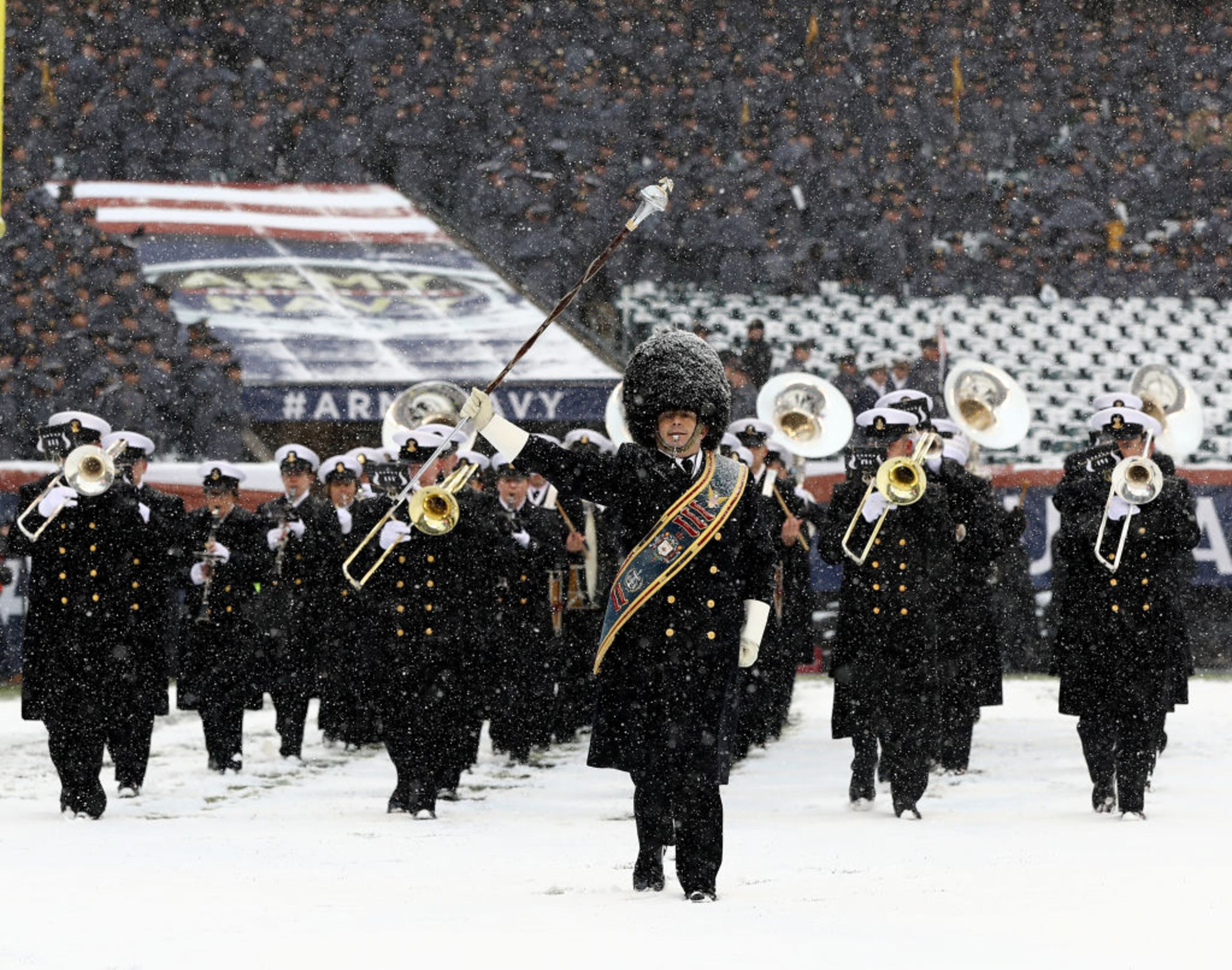 PHILADELPHIA, PA - DECEMBER 09: The Naval Academy band leasds the field duirng the March On before the game between the Army Black Knights and the Navy Midshipmen on December 9, 2017 at Lincoln Financial Field in Philadelphia, Pennsylvania. (Photo by Elsa/Getty Images)