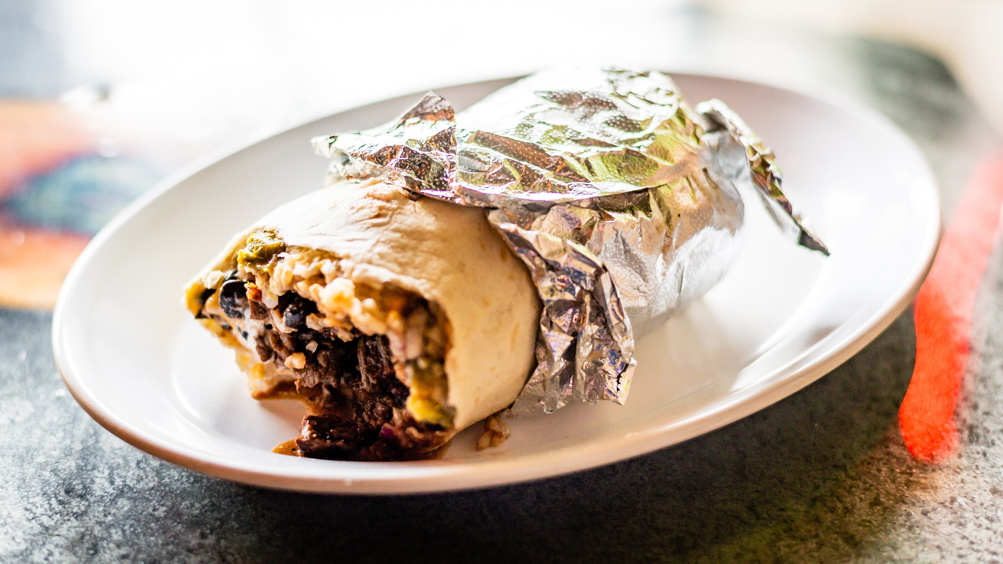 The Cajun Killer Burrito at Raging Burrito & Taco can be had with a wide variety of proteins.