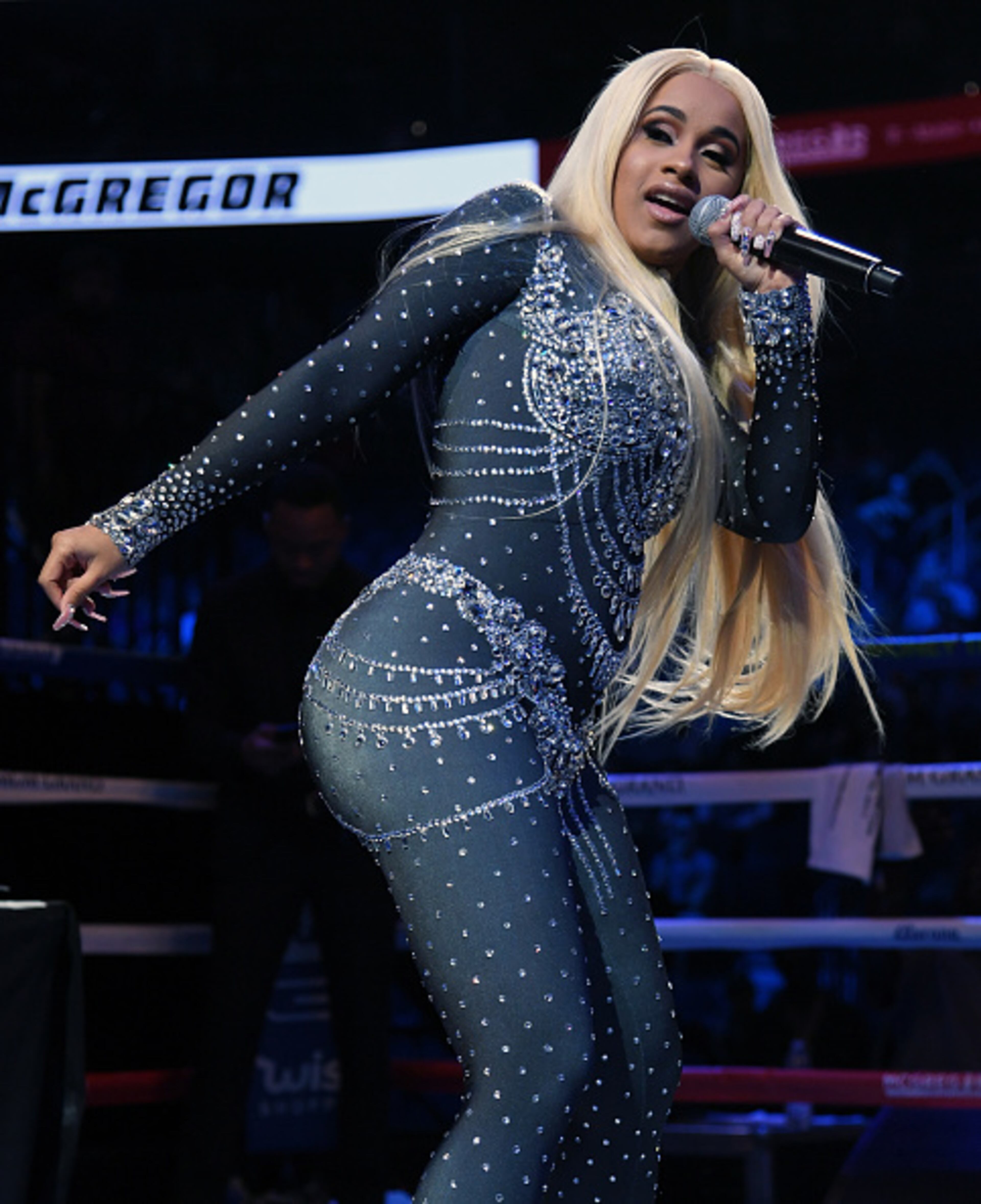 LAS VEGAS, NV - AUGUST 25: Recording artist Cardi B performs before the official weigh-in for boxer Floyd Mayweather Jr. and UFC lightweight champion Conor McGregor on August 25, 2017 in Las Vegas, Nevada. Mayweather and McGregor will meet in a super welterweight boxing match at T-Mobile Arena on August 26. (Photo by Ethan Miller/Getty Images)