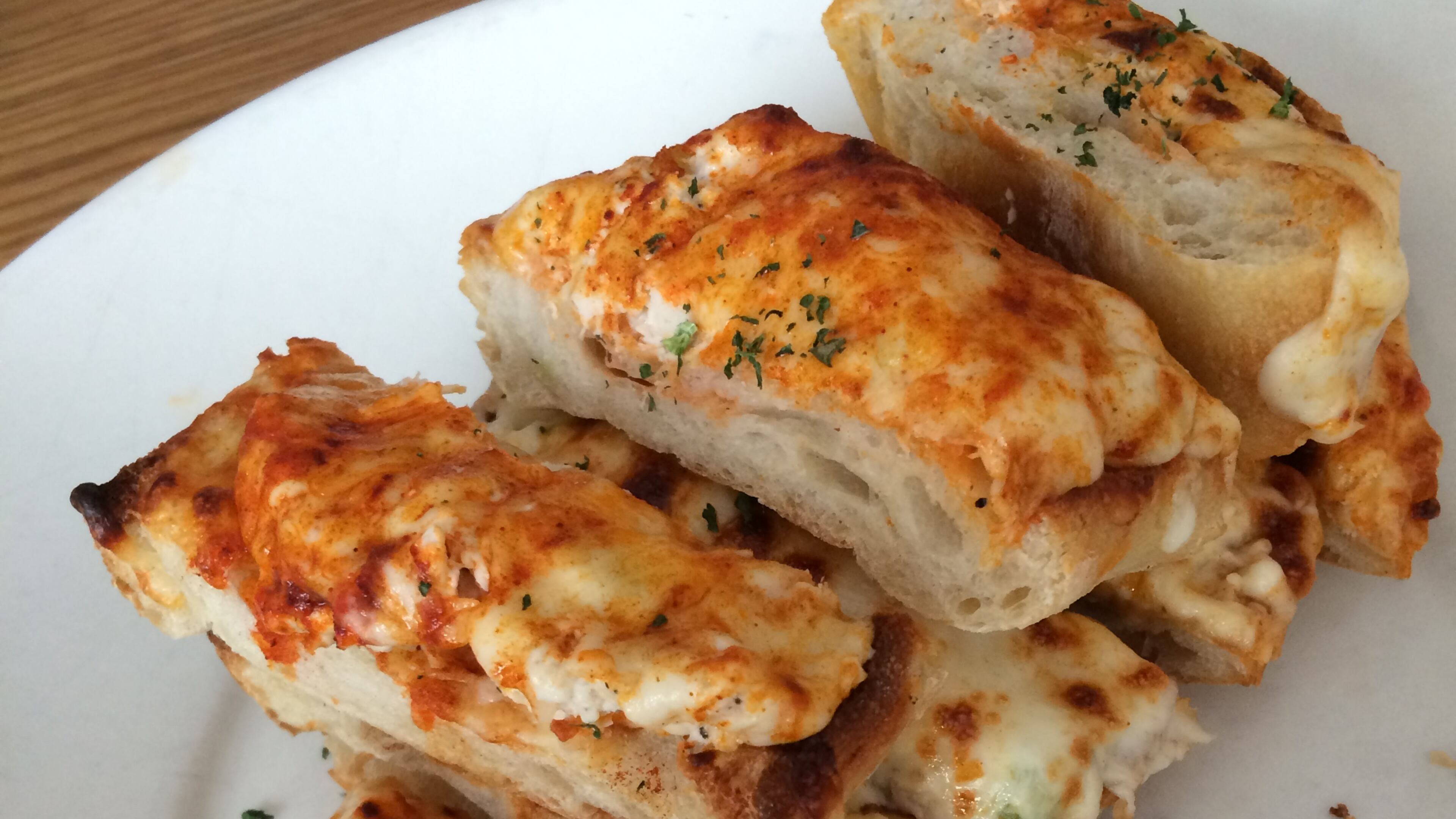 Chicken Tchoupitoulas w/ southern-style chicken salad, mozzarella and hot sauce from Pauley's Crepe Bar.