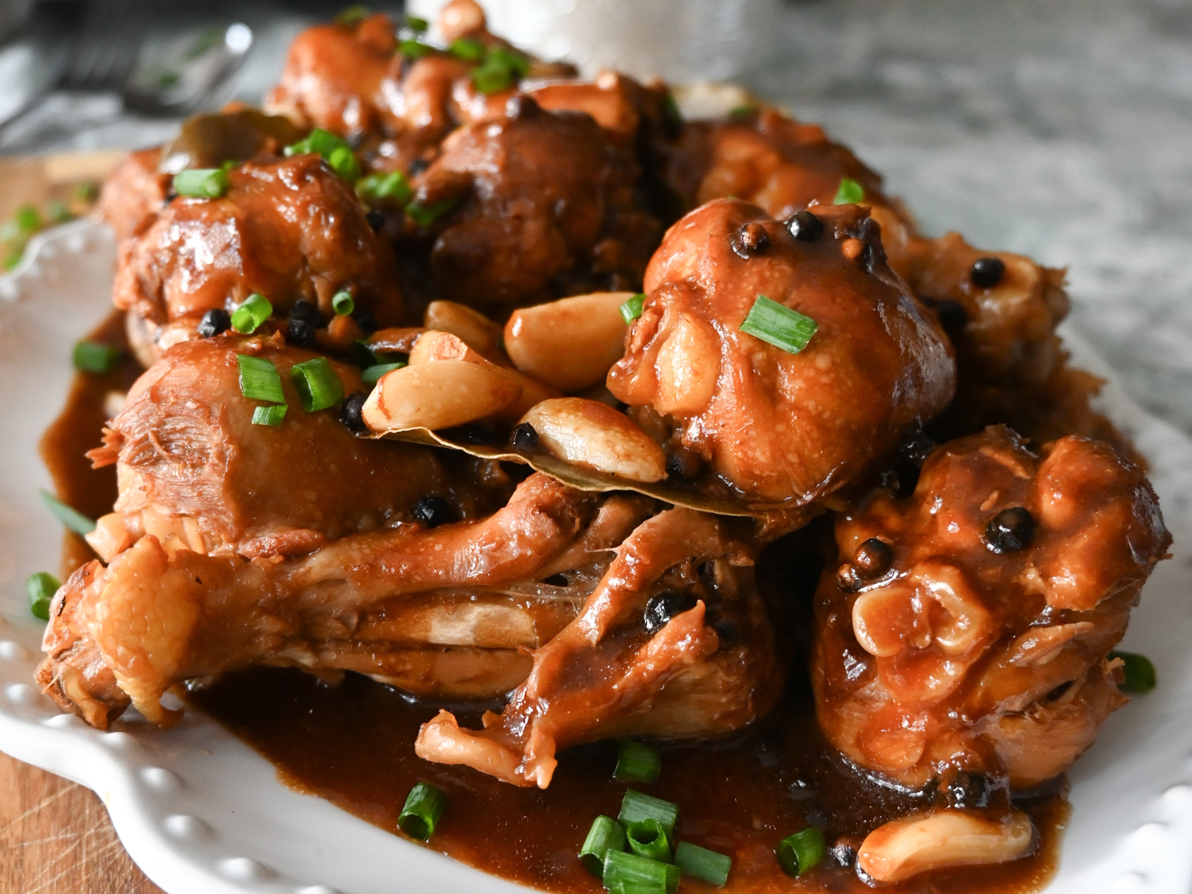 Use drumsticks to get the tastiest chicken adobo with less cooking time. (Candy Hom for the AJC)