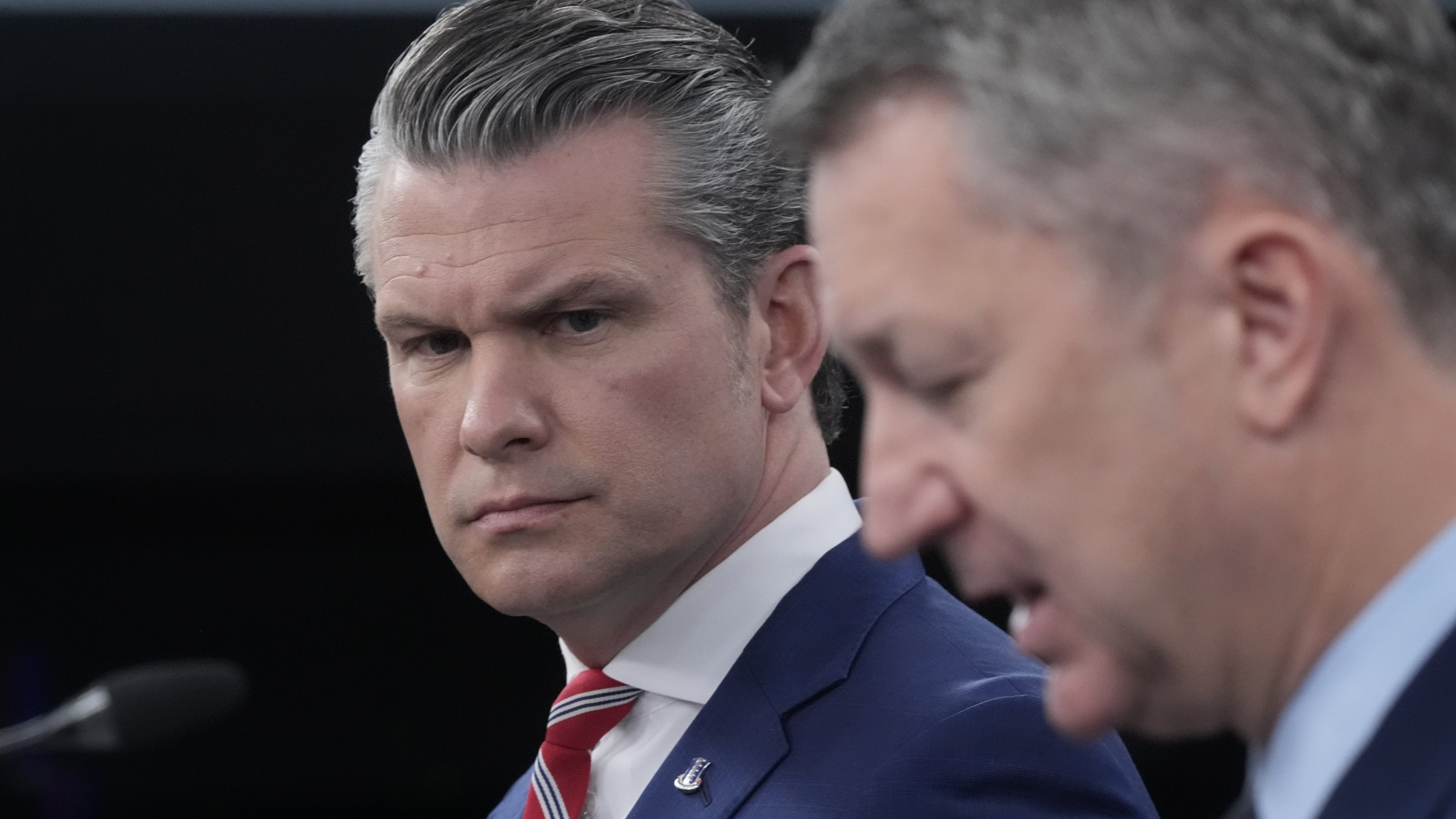 Defense Secretary Pete Hegseth and Chairman of the Joint Chiefs of Staff Gen. Dan Caine speak to members of the media during a press briefing at the Pentagon in Washington, Tuesday, May 5, 2026. (AP Photo/Manuel Balce Ceneta)