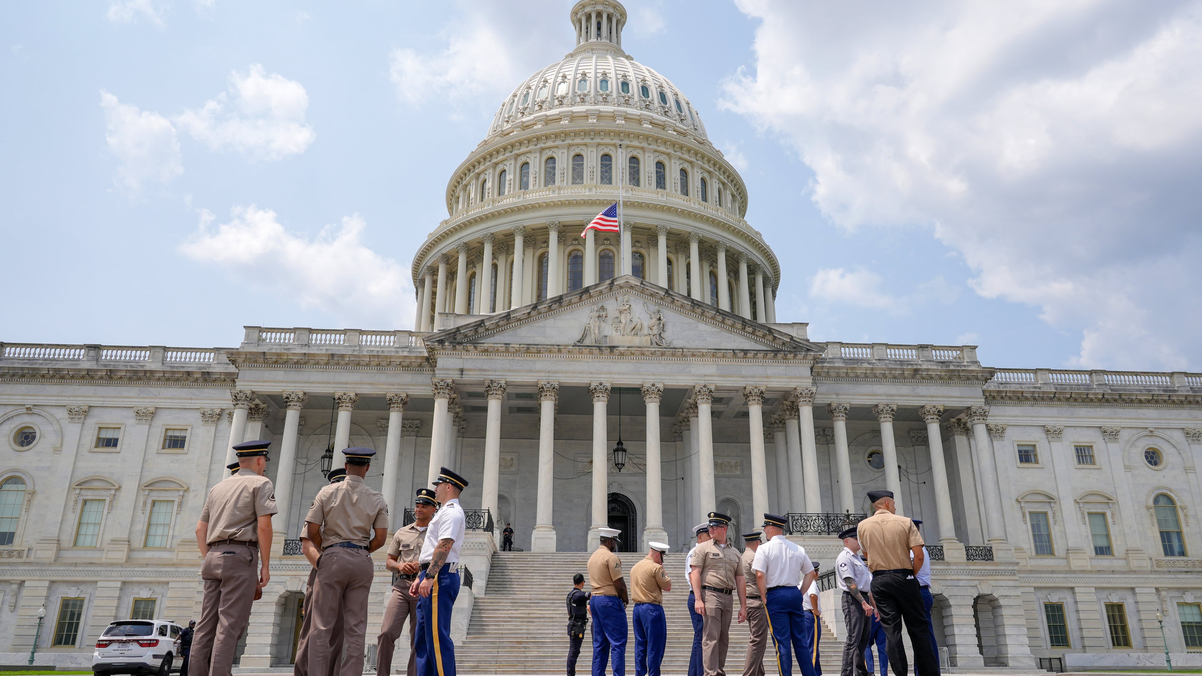 Members of the military stand outside of the U.S Capitol to practice for Sen. Lindsey Graham, R-S.C., is funeral ceremony, Monday, July 27, 2026, in Washington. (AP Photo/Mariam Zuhaib)