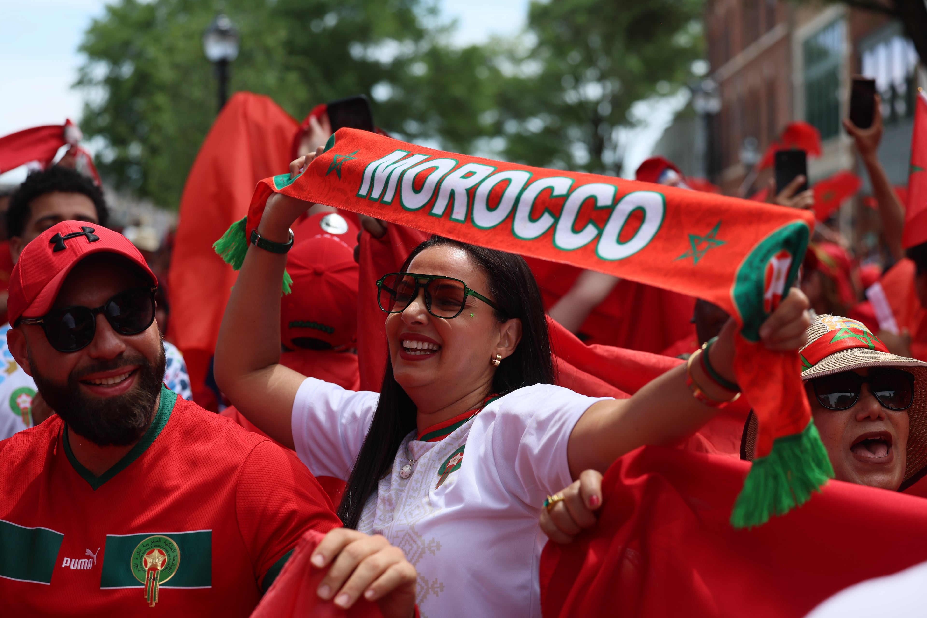 Fans of Morocco march from Founders Green on Broad Street to Atlanta Stadium (Mercedes-Benz Stadium) before the start of the Morocco vs. Haiti Group C match on Wednesday, June 24, 2026. (Jason Getz/AJC)