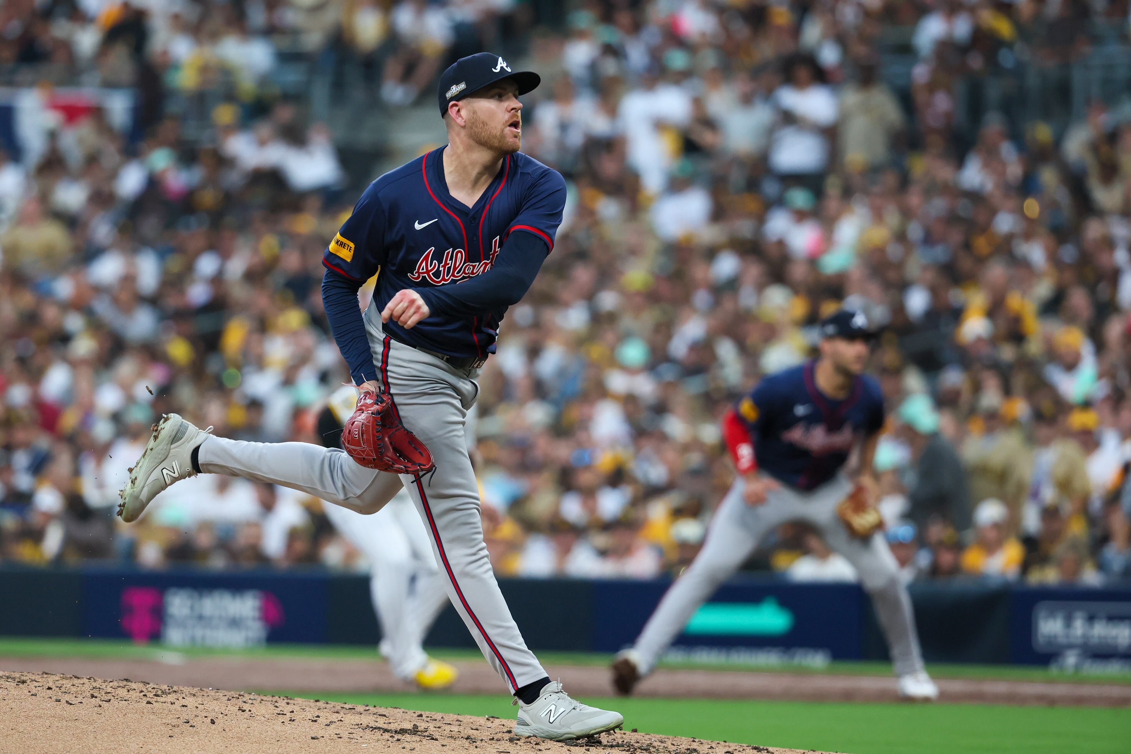 Atlanta Braves pitcher Aaron Bummer (49) delivers to the San Diego Padres after a pitching change in the second inning of National League Division Series Wild Card Game One at Petco Park in San Diego on Tuesday, Oct. 1, 2024. (Jason Getz / Jason.Getz@ajc.com)