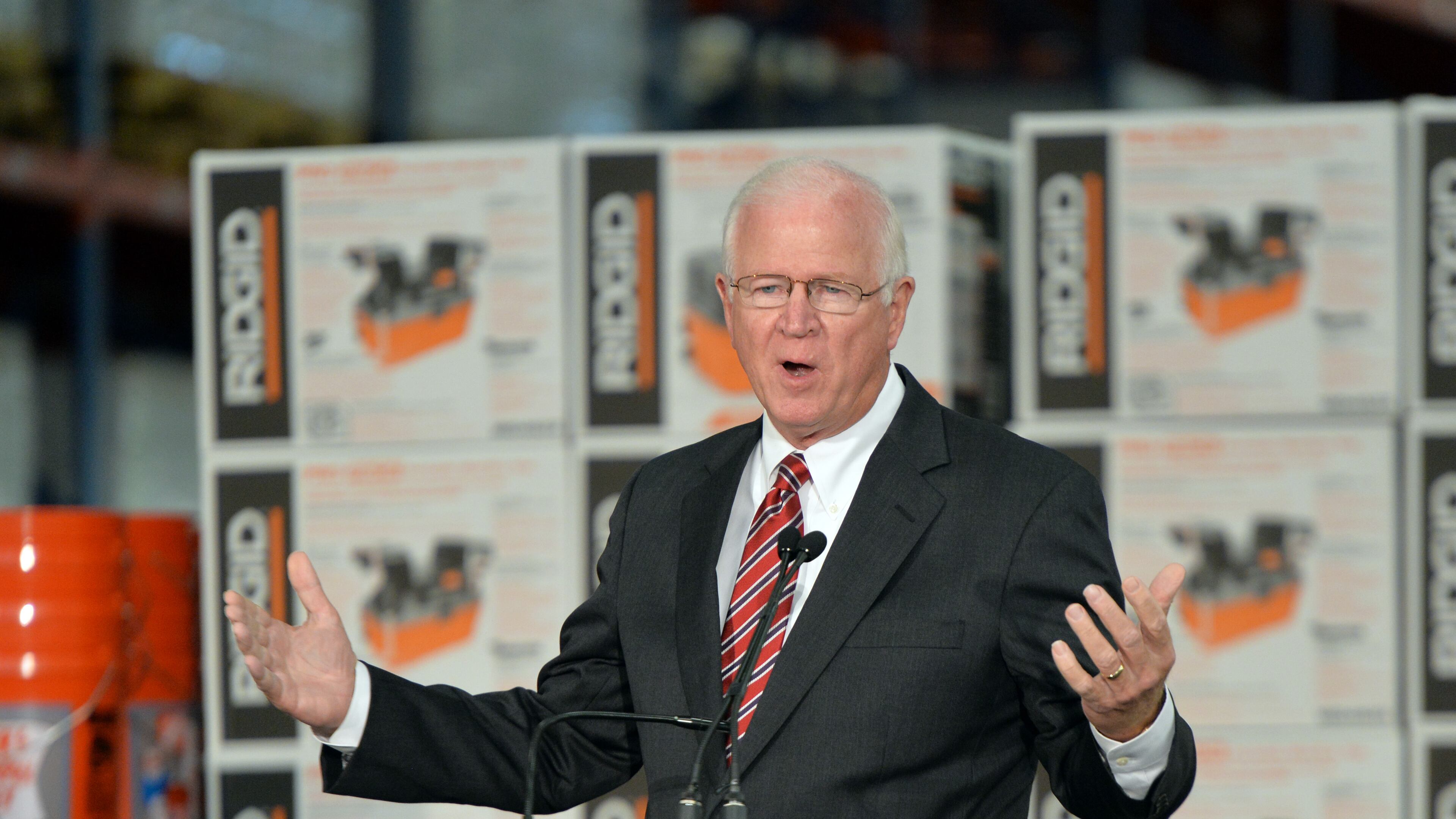 October 8, 2014 Locust Grove - Senator Saxby Chambliss speaks during a cost-sharing agreement event for the Savannah Harbor Expansion Project at Home Depot Direct Fulfillment Center on Wednesday, October 8, 2014. Gov. Nathan Deal announced that the U.S. Army Corps of Engineers, the Georgia Department of Transportation and the Georgia Ports Authority have signed a cost-sharing agreement for the Savannah Harbor Expansion Project, meaning dredging in the river could begin by the end of the year. HYOSUB SHIN / HSHIN@AJC.COM Saxby Chambliss speaks in Locust Grove in October. (AJC/Hyosub Shin)