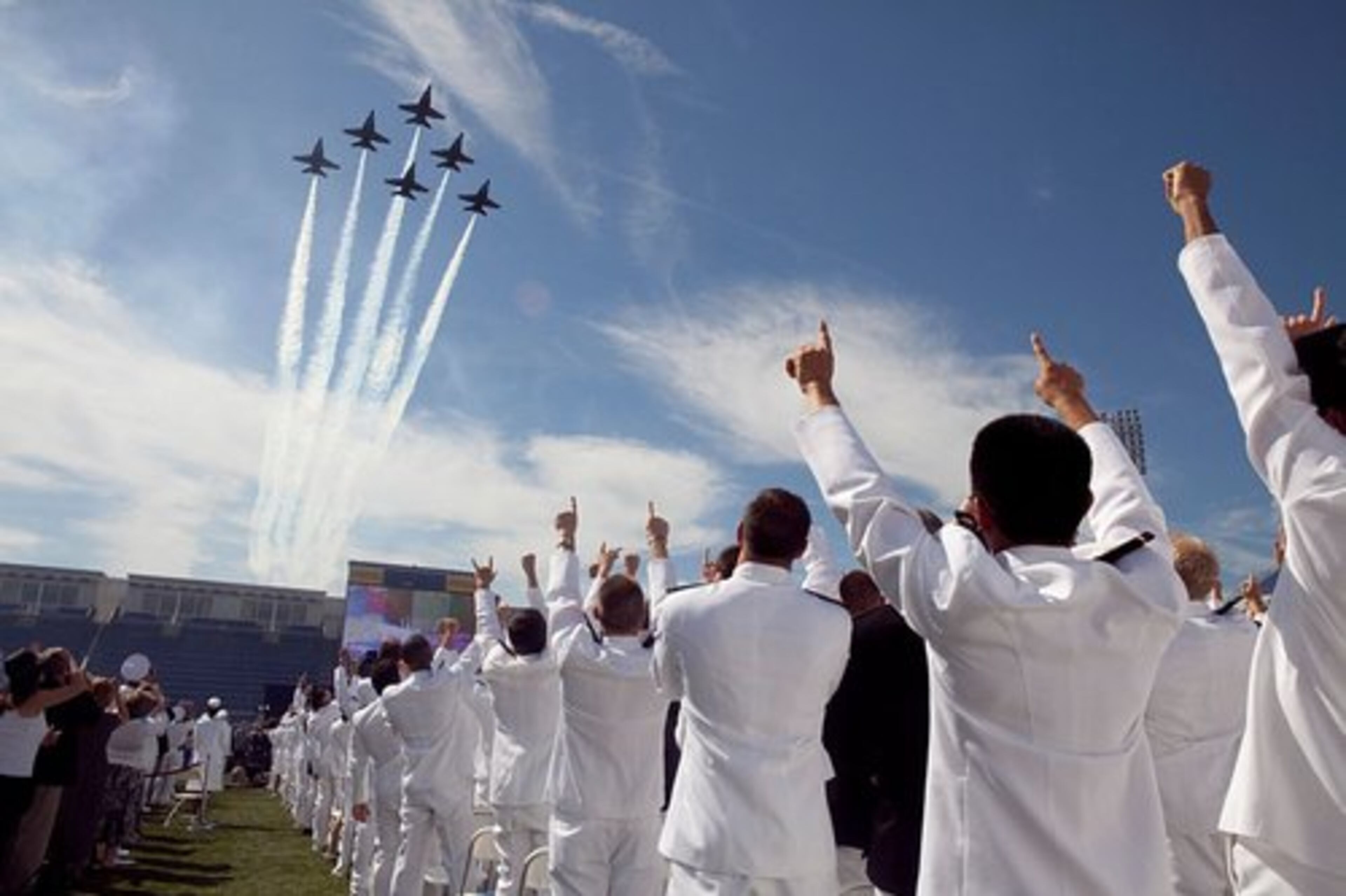 The U.S. Navy's Blue Angels fly over Navy-Marine Corps Memorial Stadium at the start of commencement exercises.