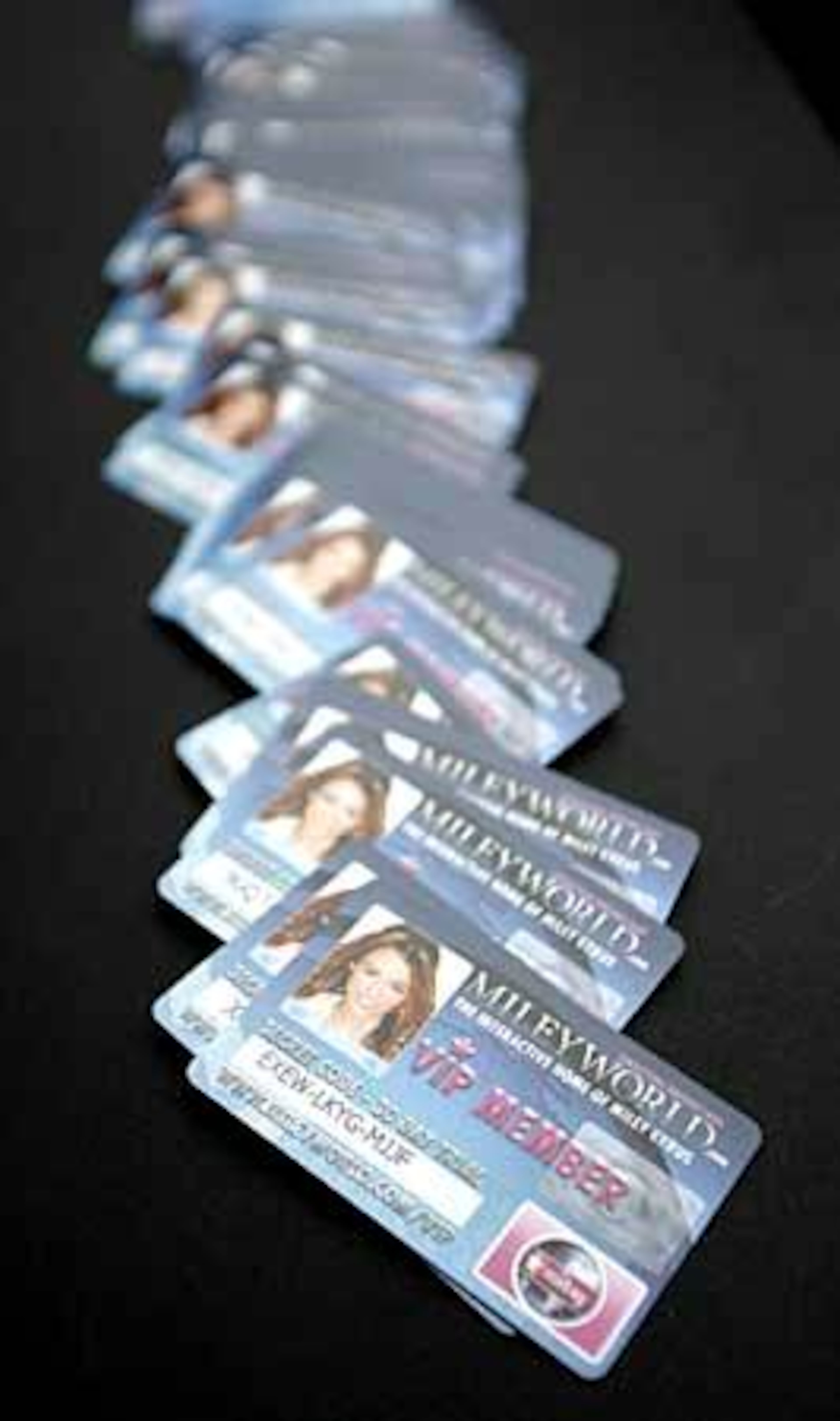 Trial VIP membership cards for the Miley Cyrus fan website, MileyWorld.com on display at the Ultimate Miley Party Bus Tour 2007 in Los Angeles.