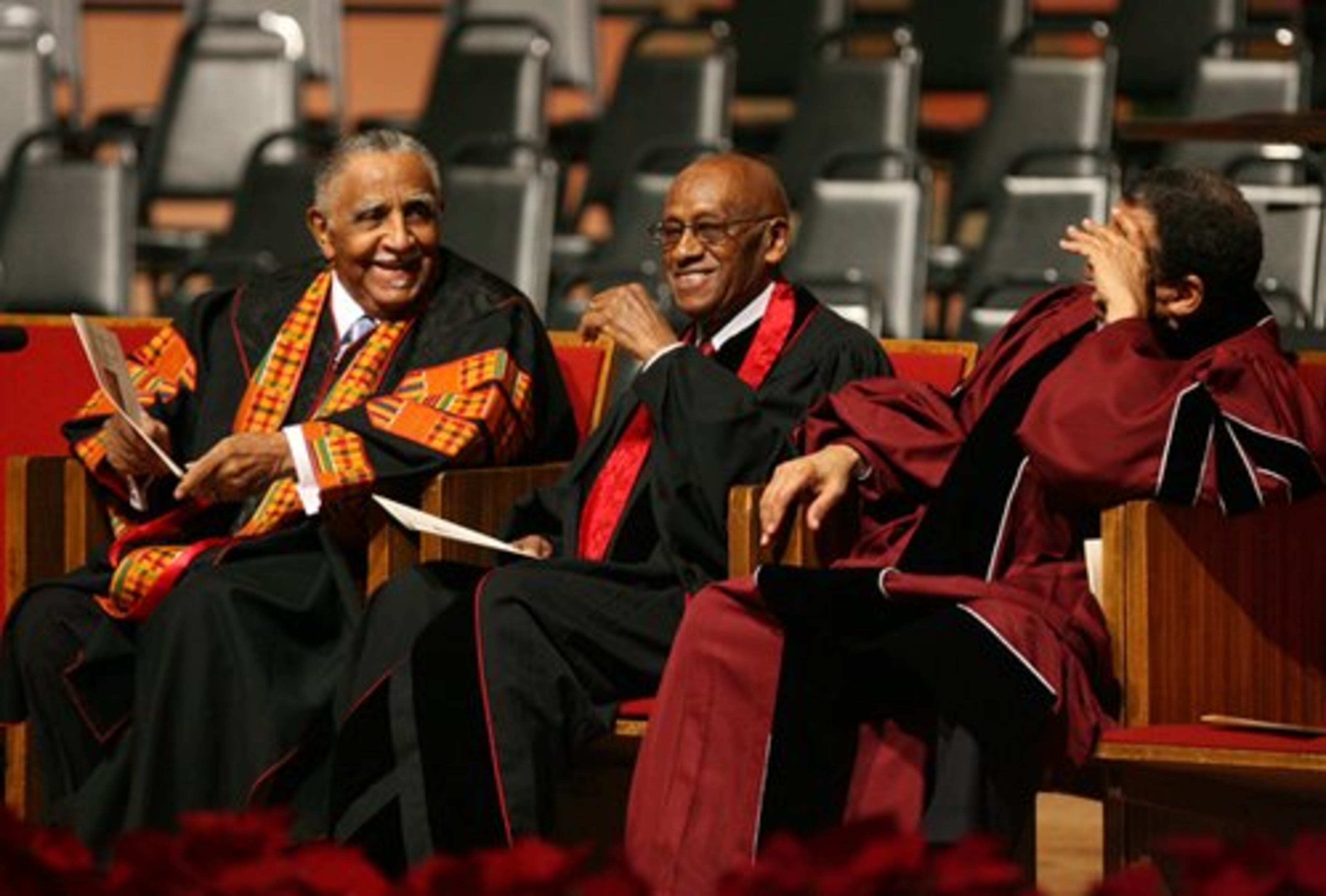 Rev. Joseph E. Lowery, Rev.Norman Rates and Rev. Andrew Young share a laugh during the funeral of James Paschal.