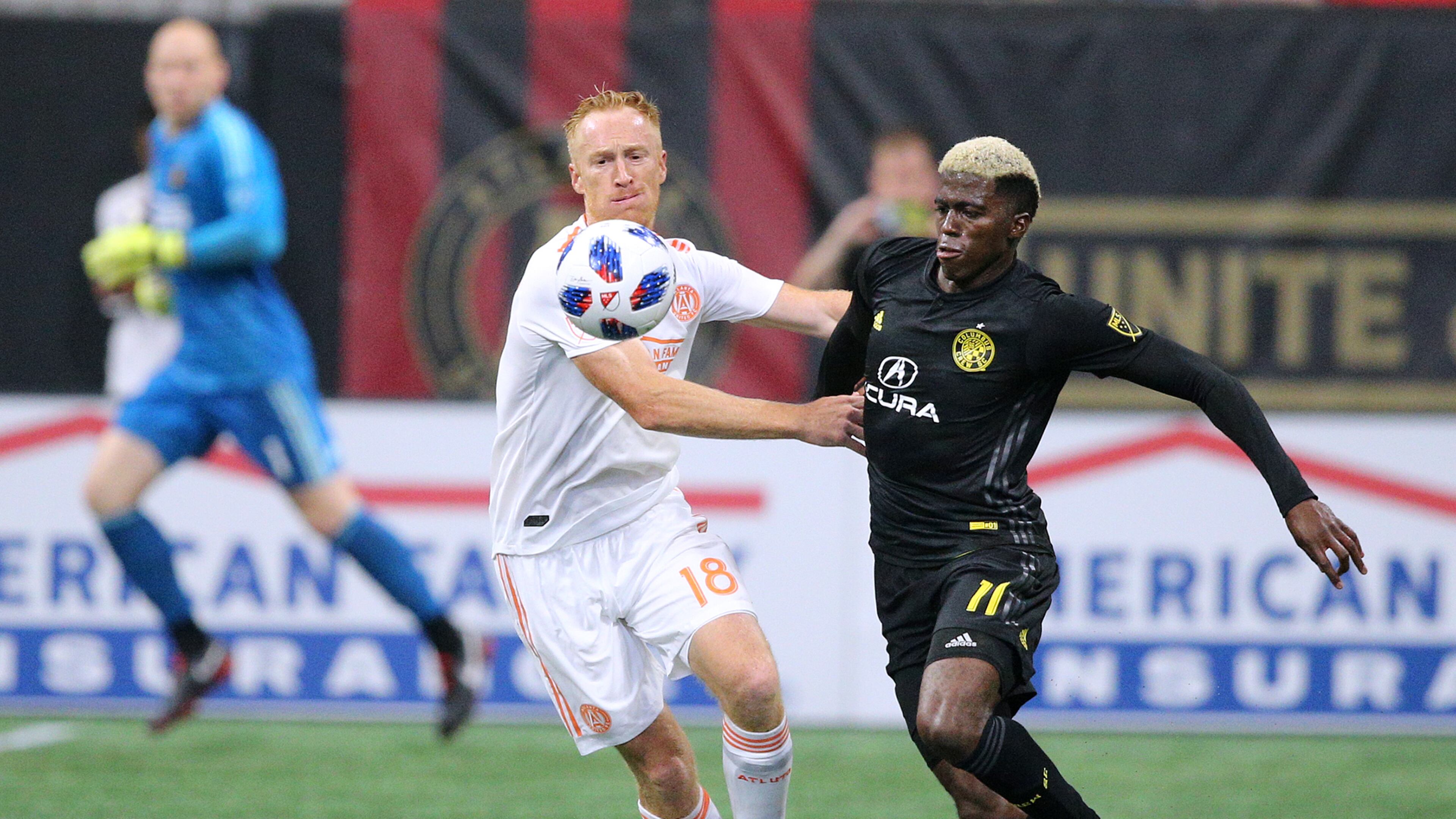 August 19, 2018 Atlanta: Atlanta United midfielder Jeff Larentowicz and Columbus Crew forward Gyasi Zardes battle for the ball during the second half in a MLS soccer match on Sunday, August 19, 2018, in Atlanta. Curtis Compton/ccompton@ajc.com