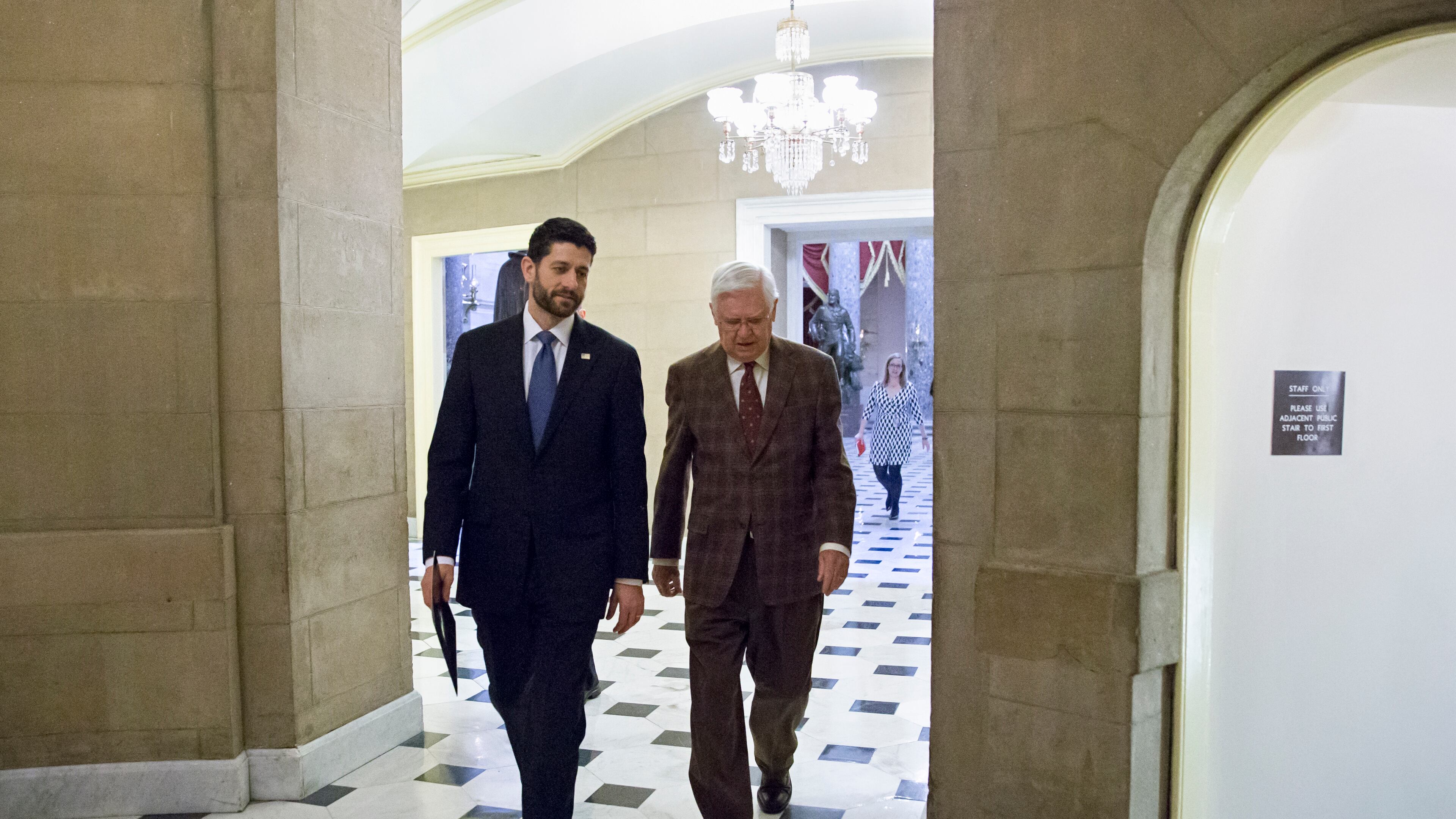 Speaker of the House Paul Ryan, R-Wis., left, and Appropriations Committee Chairman Hal Rogers, R-Ky., return to Ryan's office after passing the omnibus bill, at the Capitol in Washington, Friday, Dec. 18, 2015. The House easily passed a $1.14 trillion spending bill to fund the government through next September, capping a peaceful end to a yearlong struggle over the budget, taxes, and Republican demands of President Barack Obama. (AP Photo/J. Scott Applewhite)