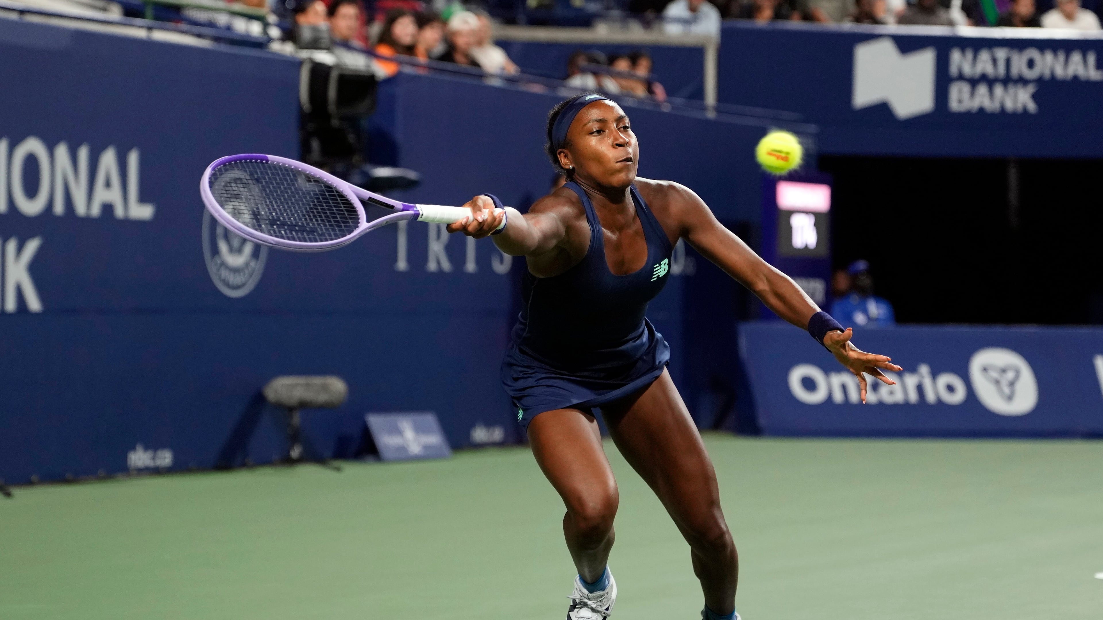 USA's Coco Gauff reaches for the ball against Kazakhstan's Elena Rybakina during a National Bank Open semi final tennis match in Toronto, Wednesday, August 12, 2026. (Chris Young/The Canadian Press via AP)