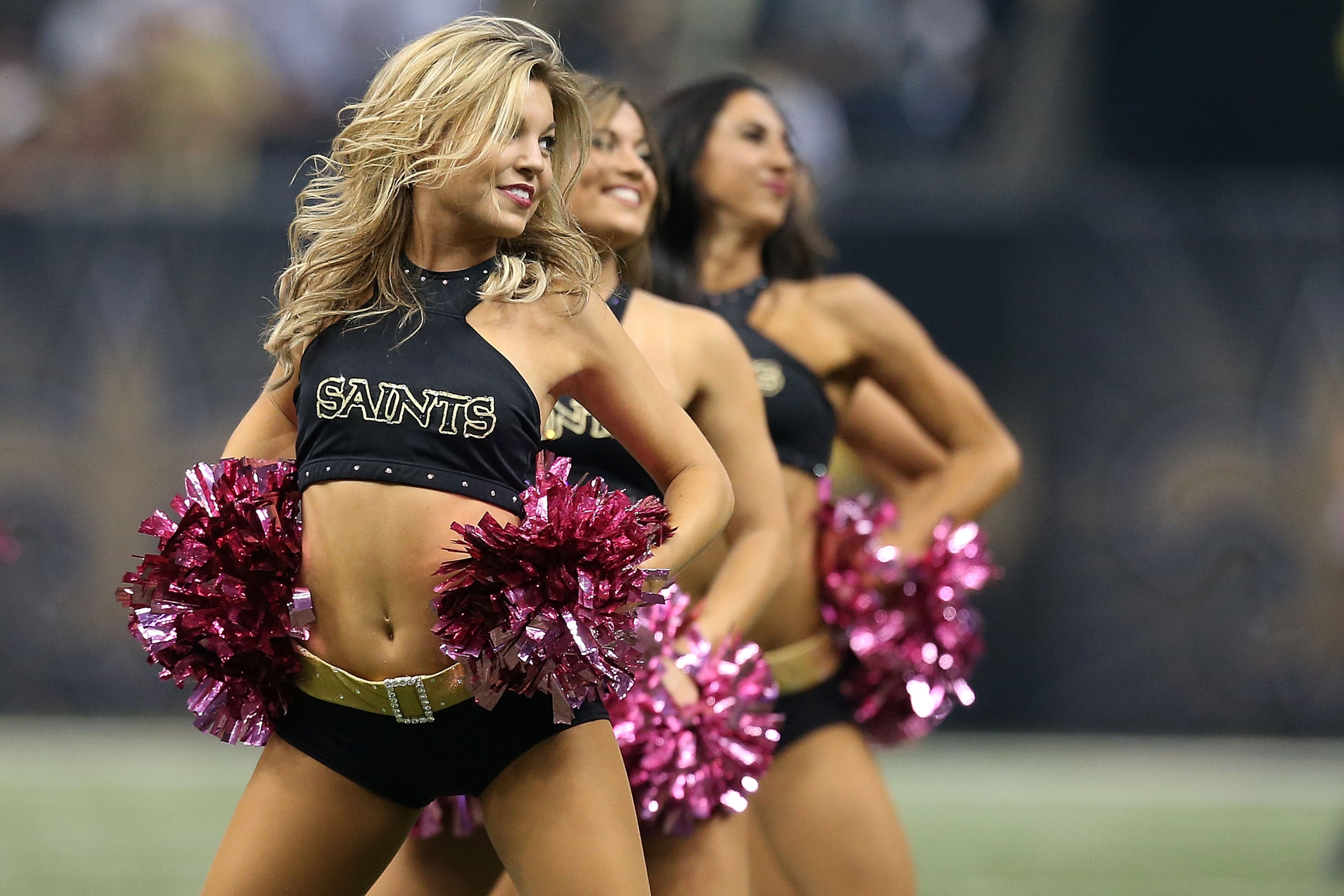 NEW ORLEANS, LA - OCTOBER 15: Cheerleaders for the New Orleans Saints perform during a game against the Atlanta Falcons at the Mercedes-Benz Superdome on October 15, 2015 in New Orleans, Louisiana. (Photo by Sean Gardner/Getty Images)