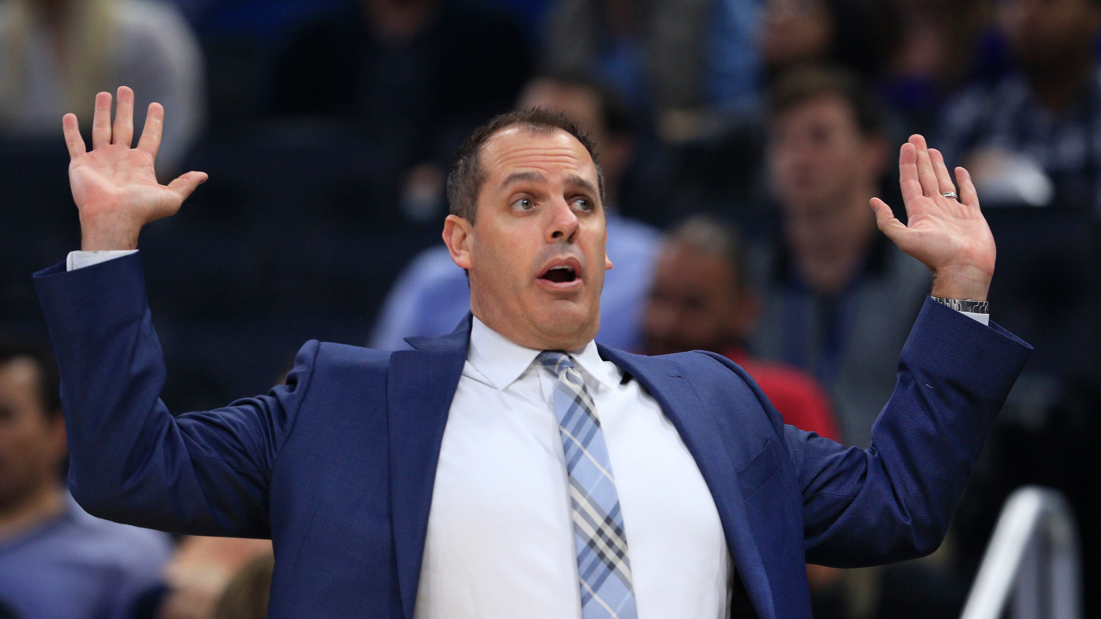Orlando Magic head coach Frank Vogel signals to a player during the first half of an NBA basketball game against the Brooklyn Nets in Orlando, Fla., on Friday, Dec. 16, 2016. (AP Photo/Reinhold Matay)