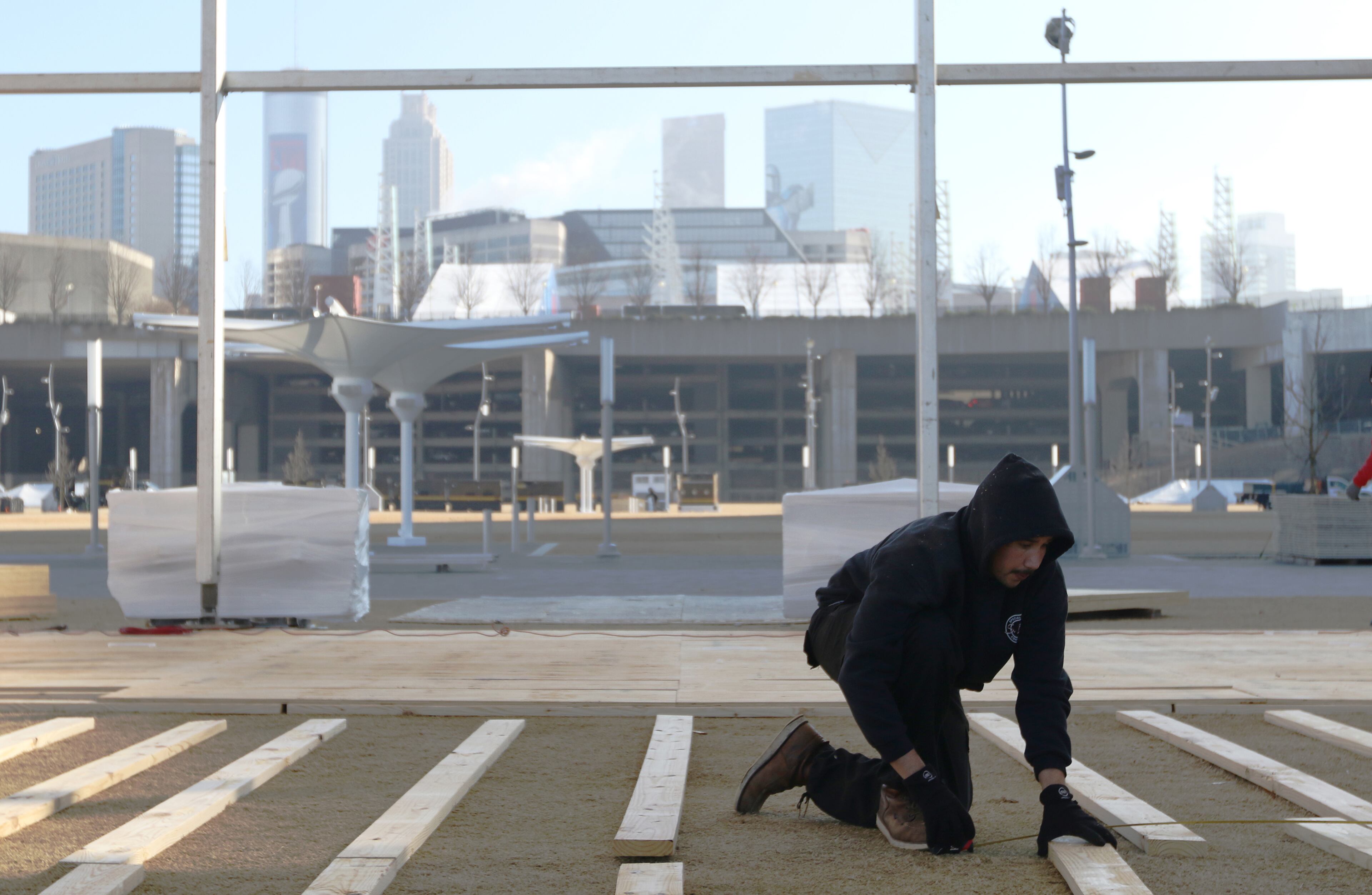 1/16/19 - Atlanta - Construction workers build items for the Super Bowl next to Mercedes-Benz Stadium, where it will be hosted in February. The city of Atlanta is preparing to host the Super Bowl, and this is one of the many preparations going on around town.
EMILY HANEY / emily.haney@ajc.com