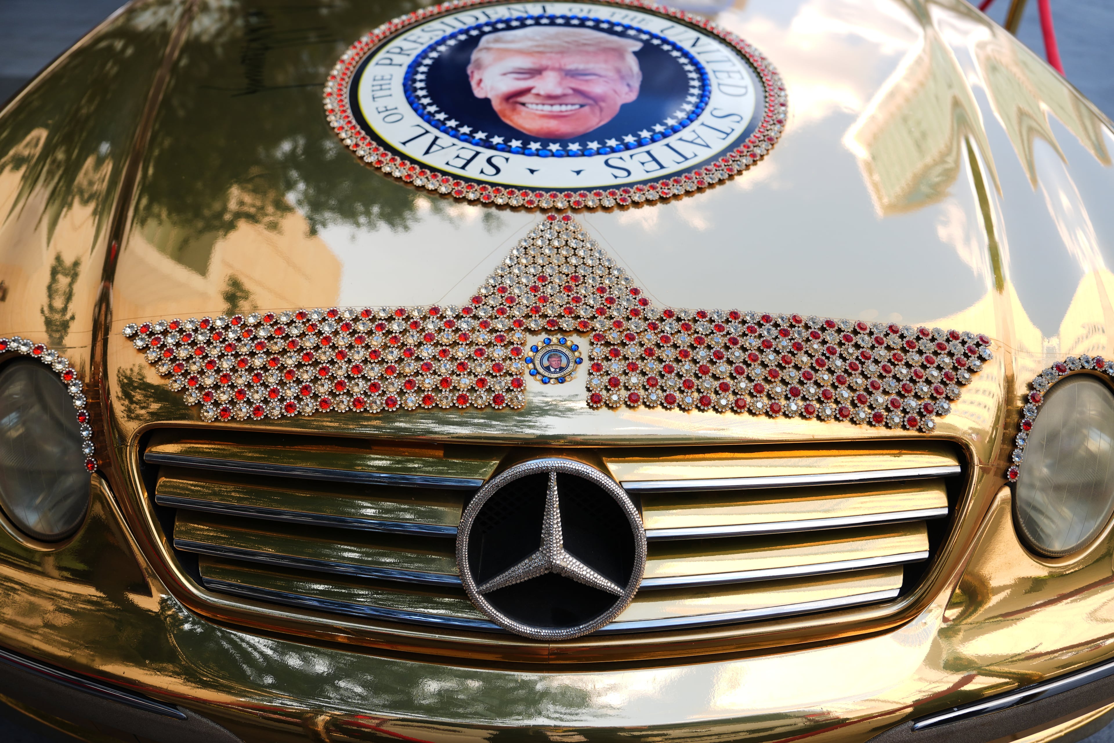 A Mercedes decorated with images of President Donald Trump is seen outside in Dallas on Tuesday before the Republican convention. (Julia Demaree Nikhinson/AP)