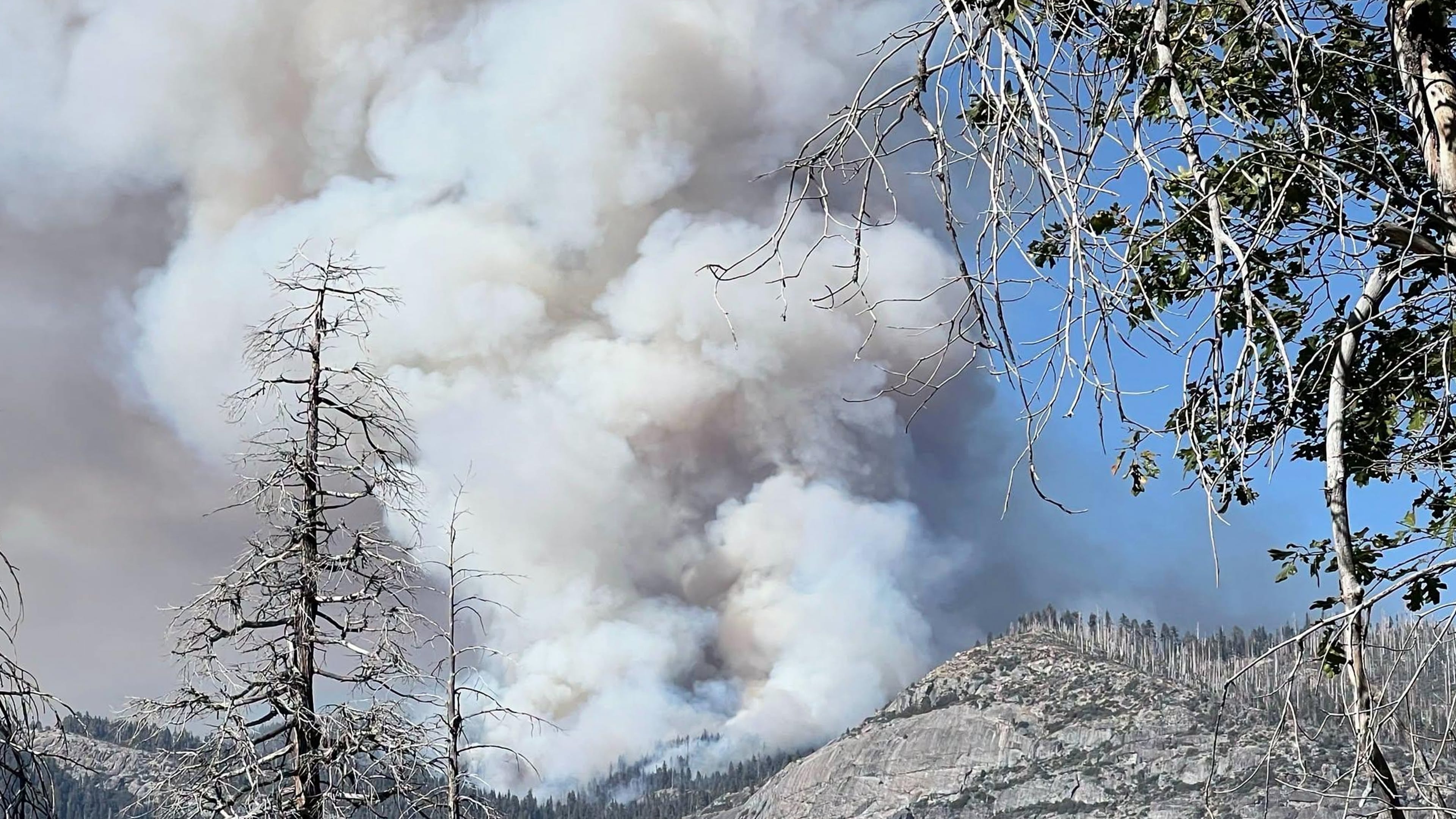 This photo provided by the National Parks Service shows the Dome Fire burning in Yosemite National Park on Tuesday, Sept. 15, 2026. (National Parks Service via AP)
