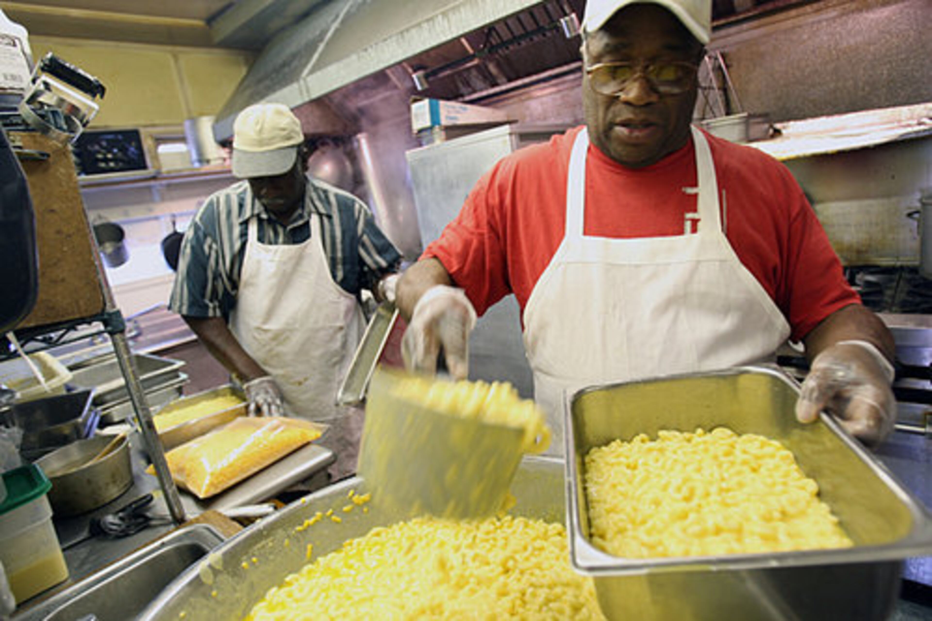 Long time employees Harold Marshall, 53 (left) and William Christian, 67, have worked at the restaurant for over 25 years. "I'm going fishing, " Christian said, after the restaurant closes.