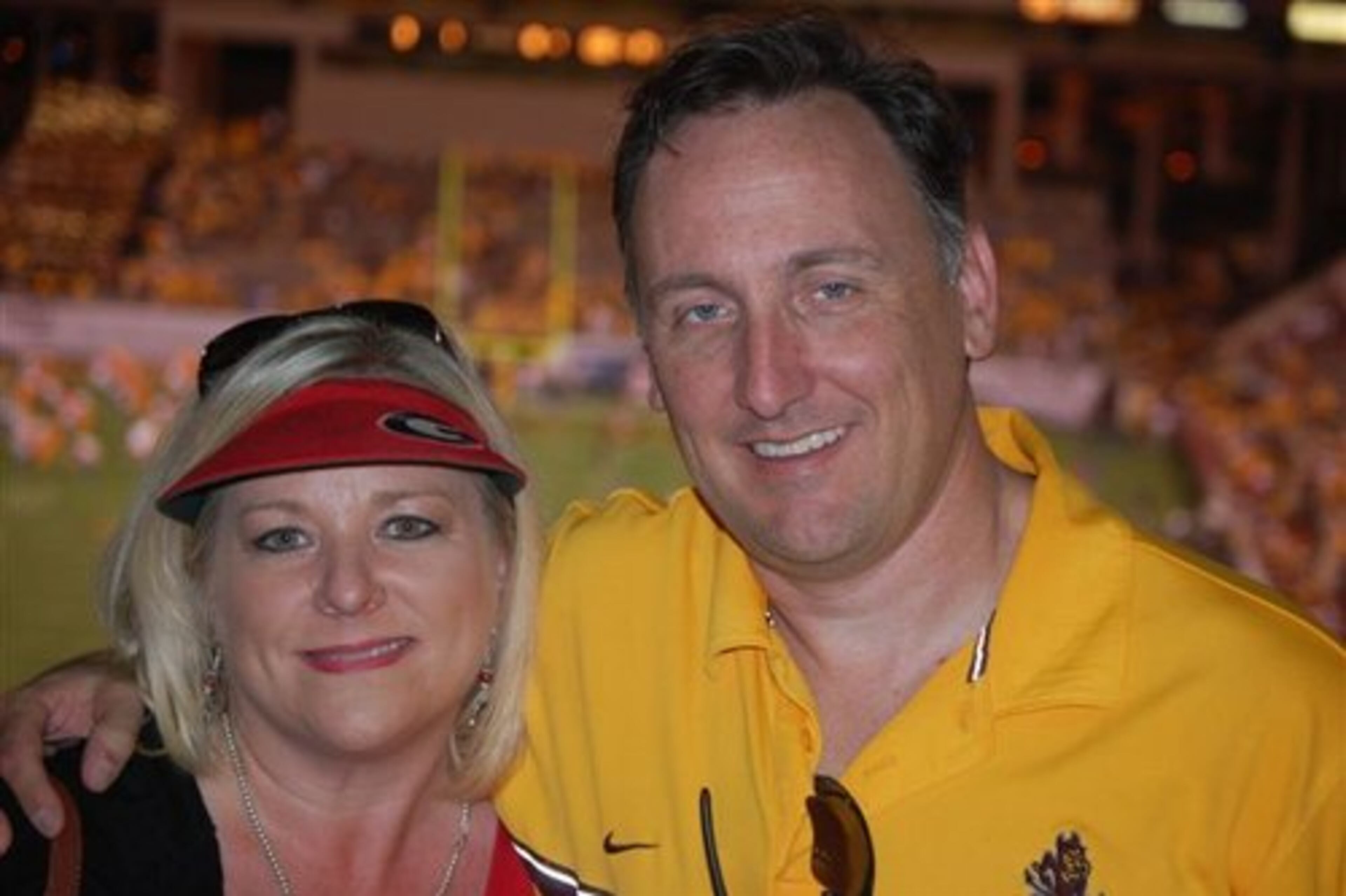 Jenifer & Paul Germer ( A mixed marriage of Dawg & Sun Devil)