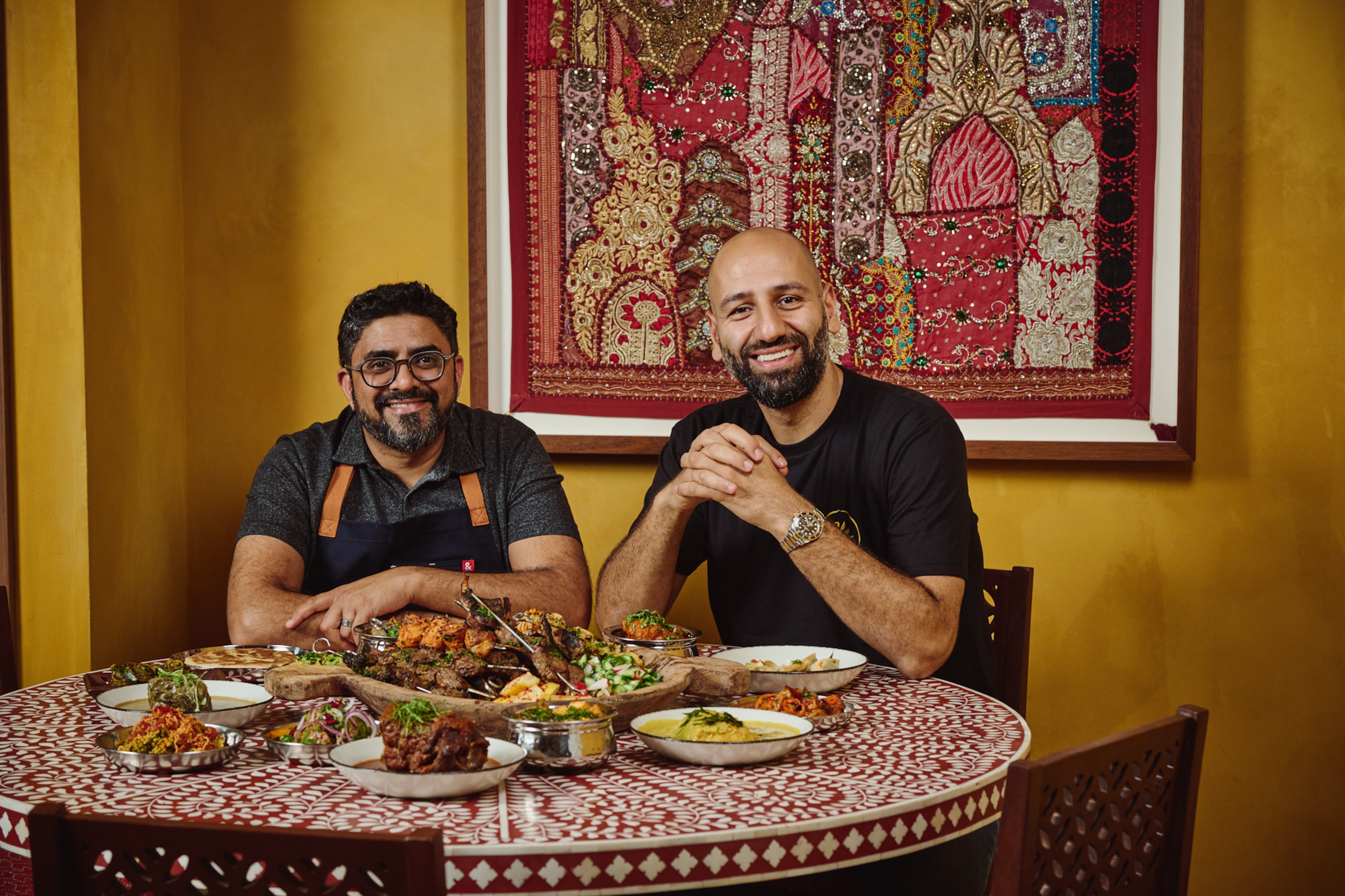 Chef Niven Patel (left) and Mo Alkassar, co-owners of FEAL Hospitality, the group behind Ghee Indian Kitchen. (Felipe Cuevas/Courtesy of Ghee Indian Kitchen)