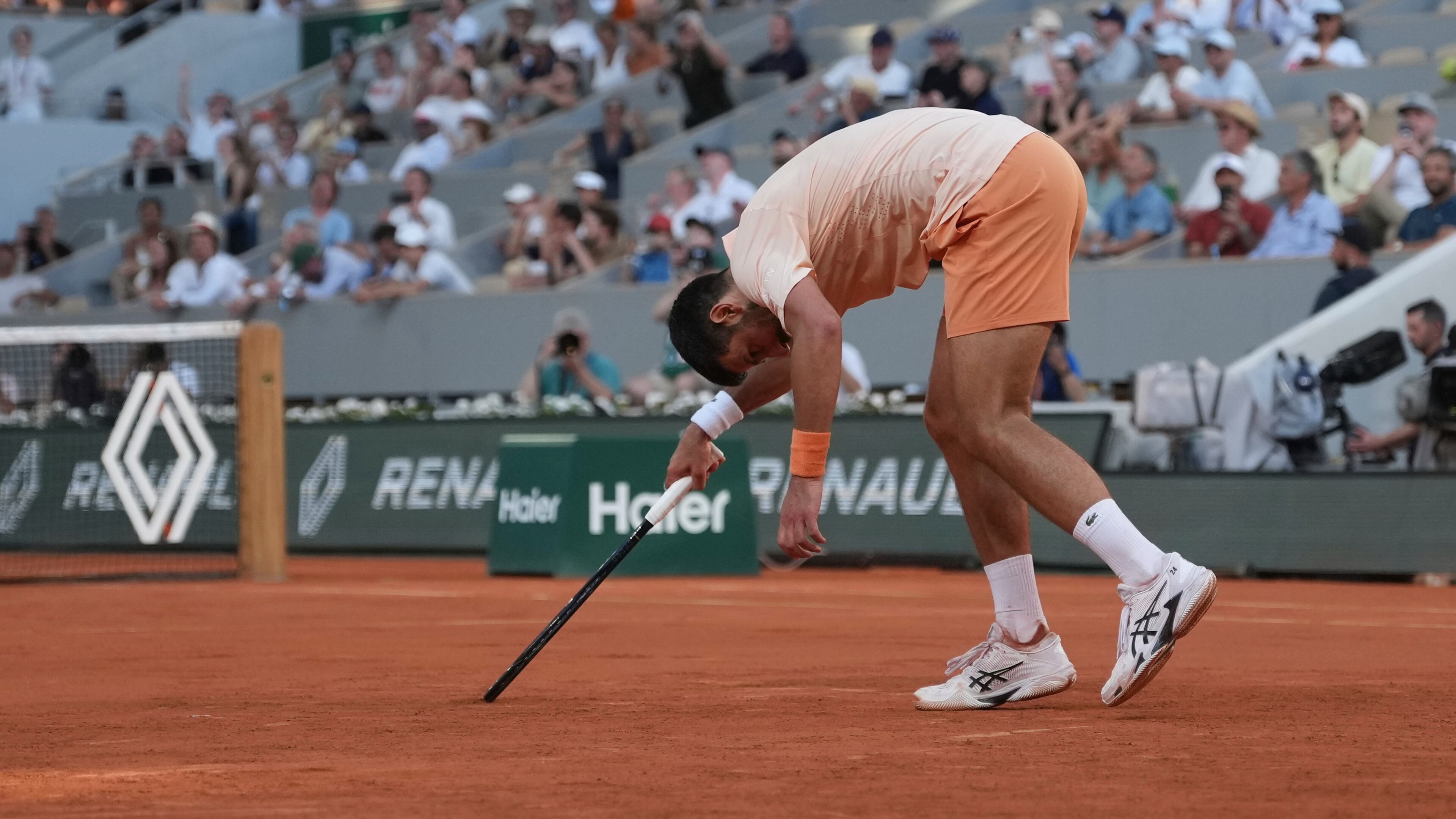 Novak Djokovic of Serbia celebrates after winning against Valentin Royer of France during their second round men's singles tennis match at the French Open tennis tournament in Paris, Wednesday, May 27, 2026. (AP Photo/Thibault Camus)