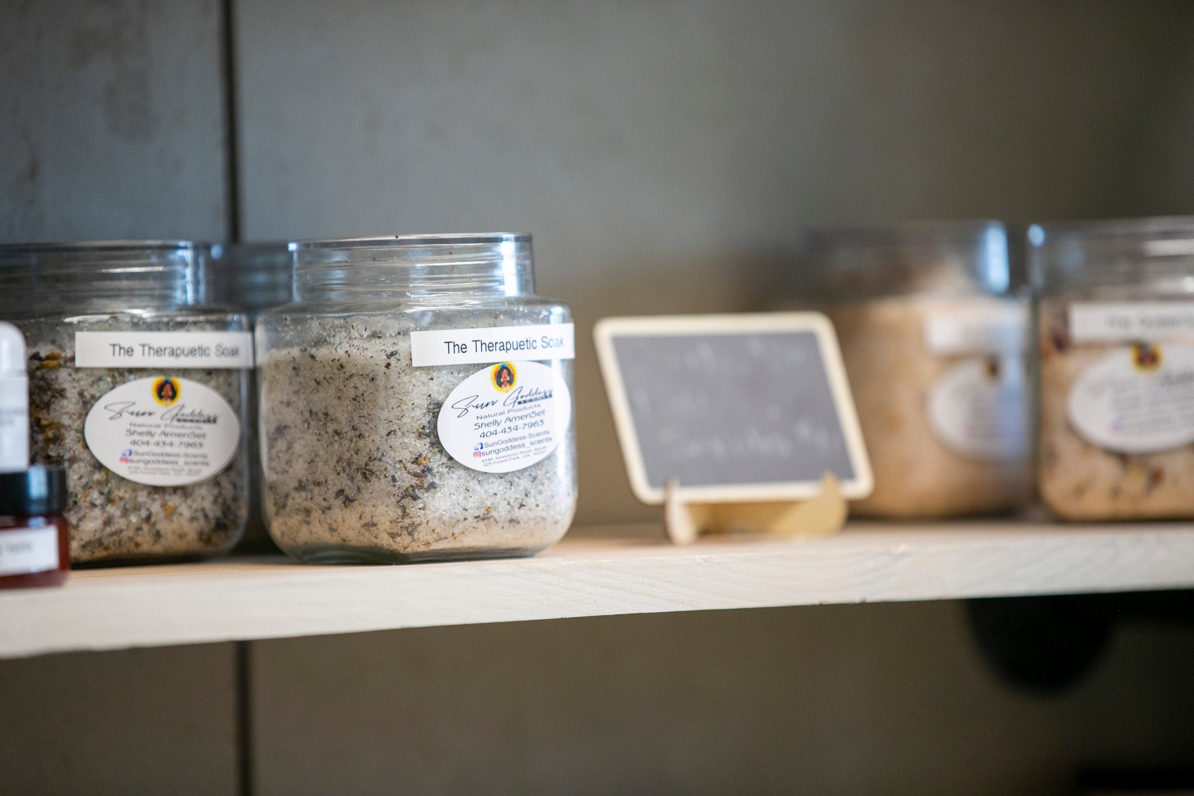 Frugal Chics Roc collaboration products are seen at their space in the Nia Building at Pittsburgh Yards, a professional and maker space near Adair Park, Capitol Gateway, Mechanicsville, Peoplestown, Pittsburgh and Summerhill neighborhoods in southwest Atlanta on Tuesday, September 7, 2021. (Rebecca Wright for the Atlanta Journal-Constitution)