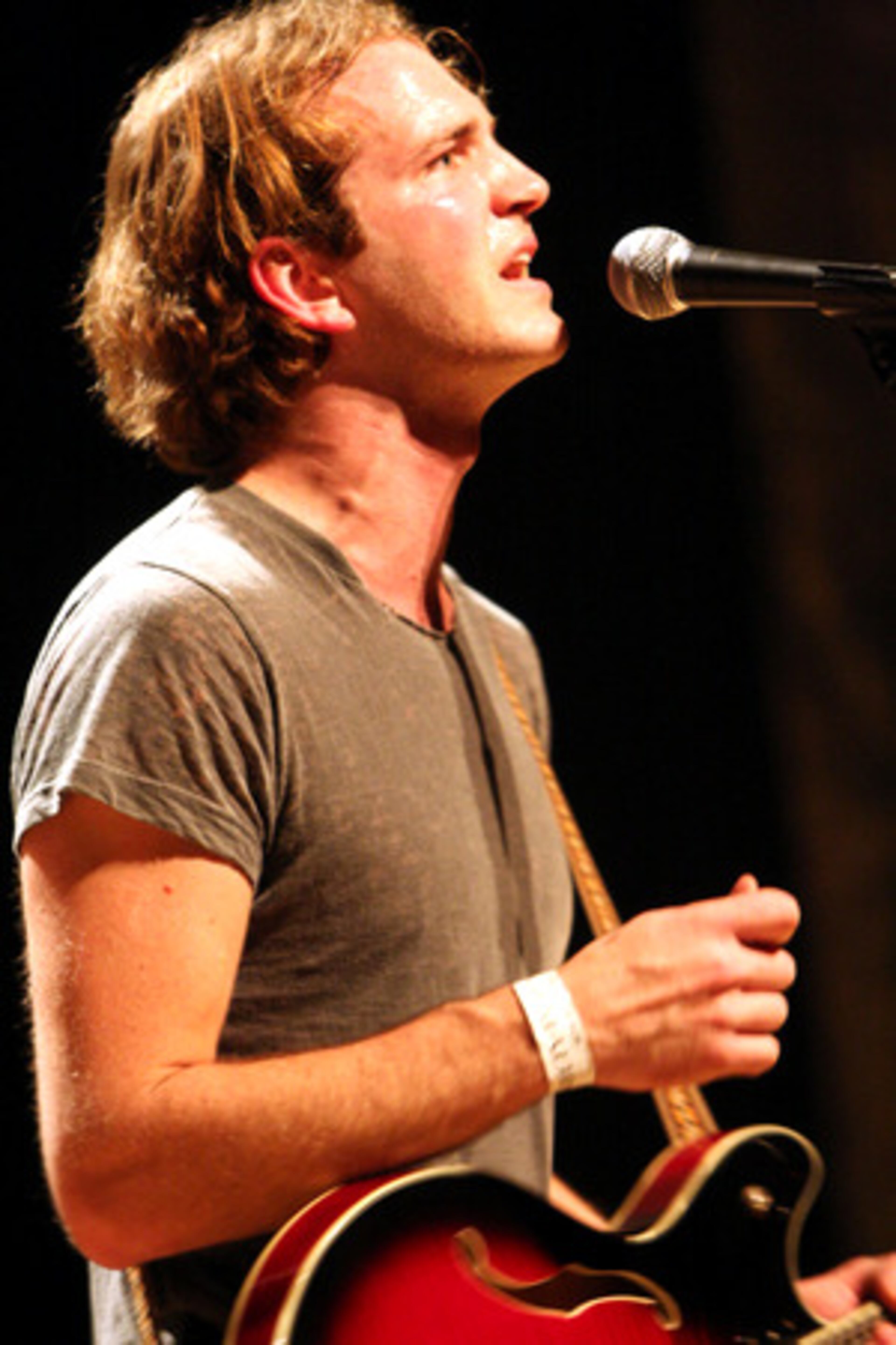 Jordan Jeffares leads popular Atlanta band Snowden Friday night at the Stomp and Stammer 11th birthday celebration.