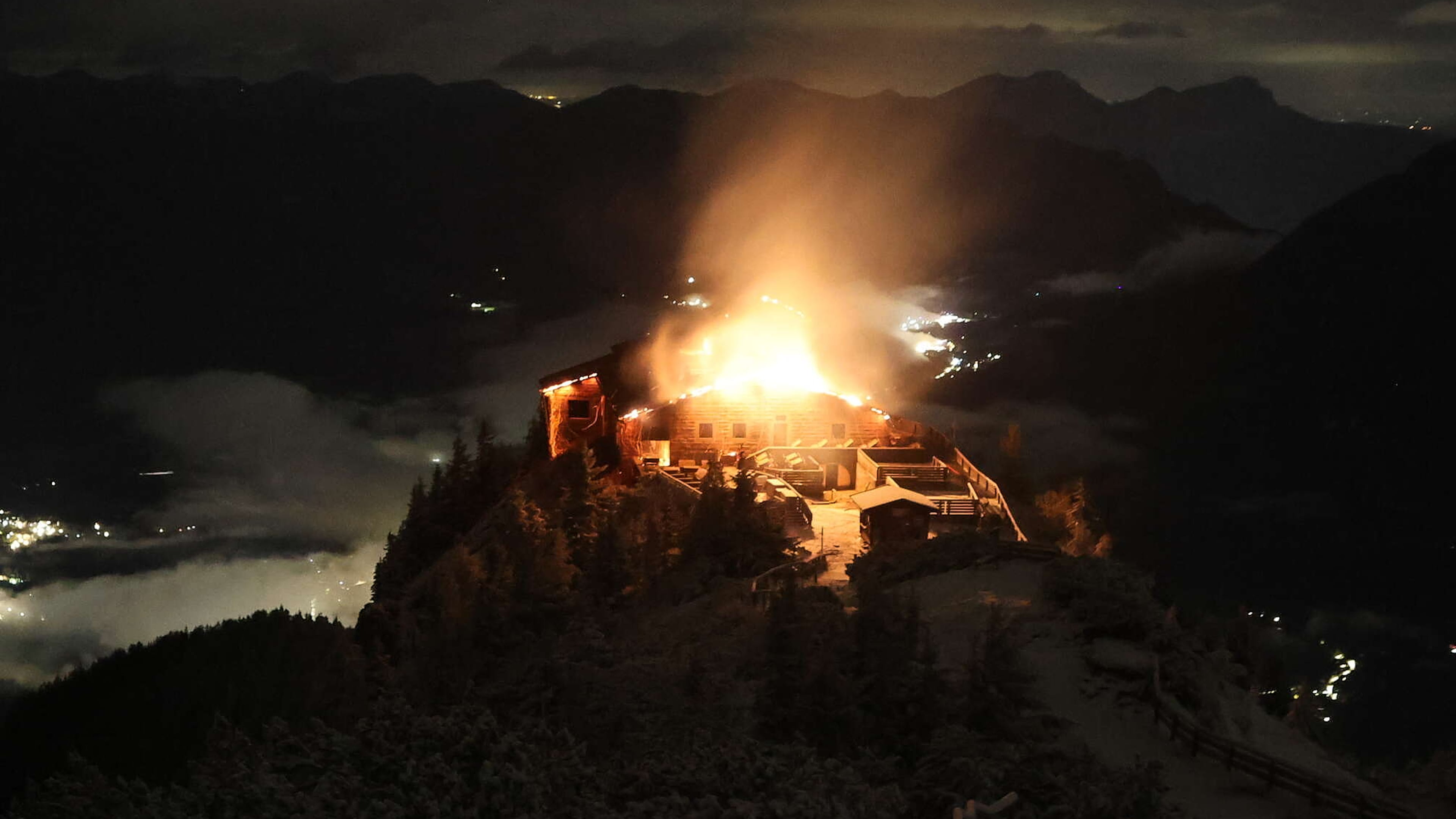 This image distributed by the 'Bergerlebnis Berchtesgaden' shows a building known as the Eagle's Nest built for Adolf Hitler in the Bavarian Alps on fire early Saturday, Oct. 24, 2026. (Bergerlebnis Berchtesgaden via AP)