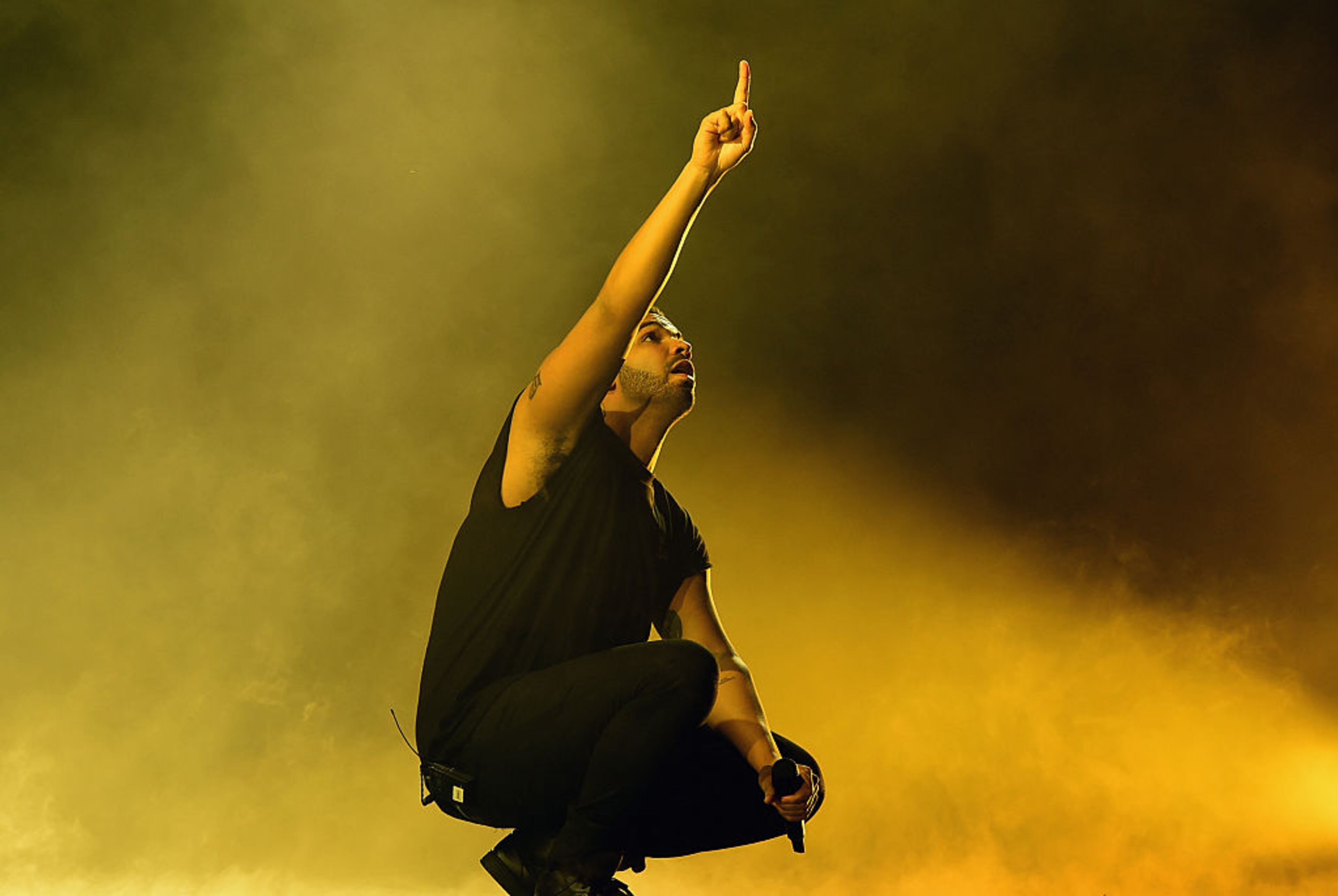 INDIO, CA - APRIL 12: Rapper Drake performs onstage during day 3 of the 2015 Coachella Valley Music & Arts Festival (Weekend 1) at the Empire Polo Club on April 12, 2015 in Indio, California. (Photo by Kevin Winter/Getty Images for Coachella)