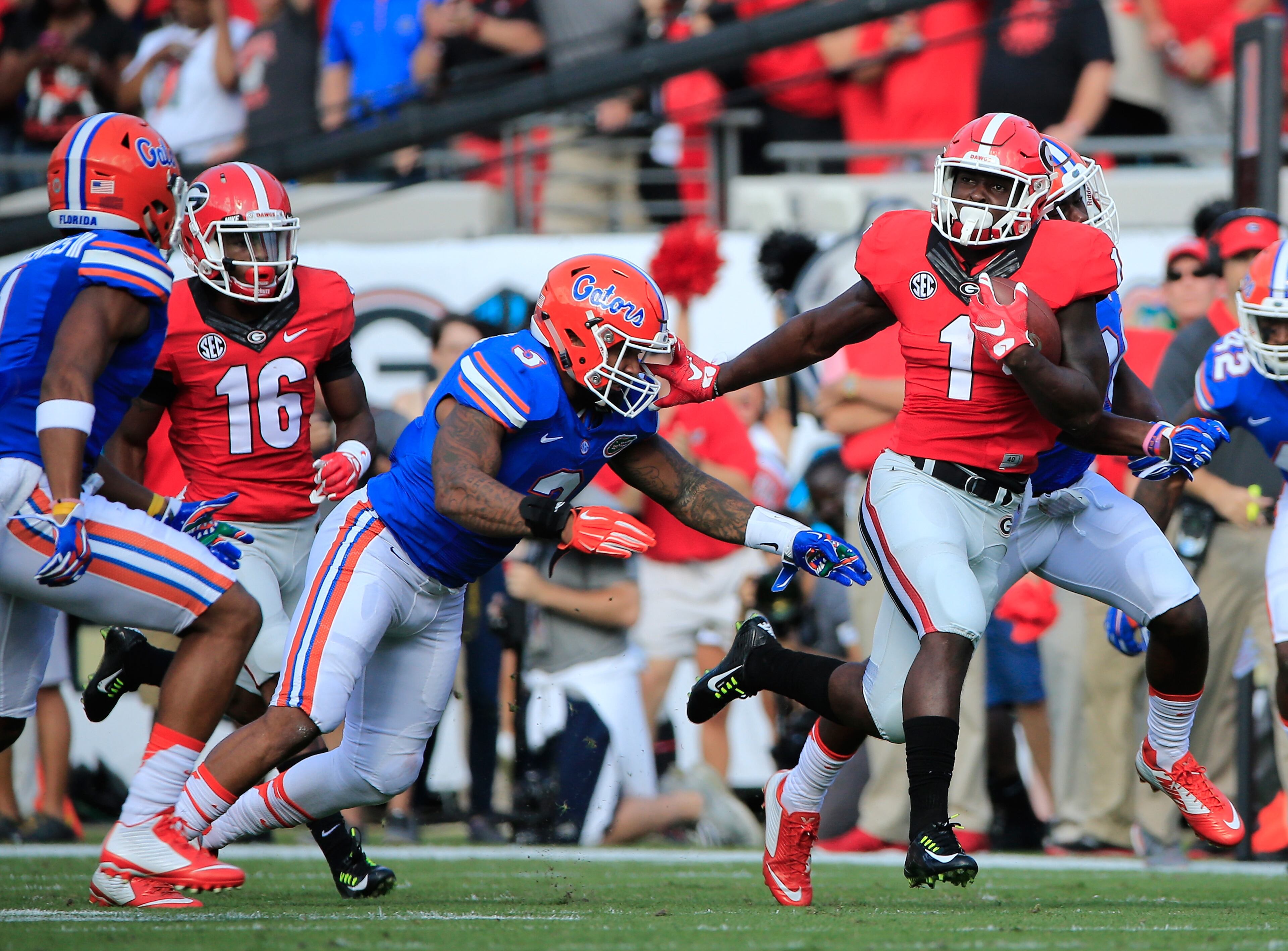 Junior Sony Michel (1) of Georgia rushed for 1,161 yards on 219 carries last season and scored eight touchdowns rushing. (Photo by Sam Greenwood/Getty Images)