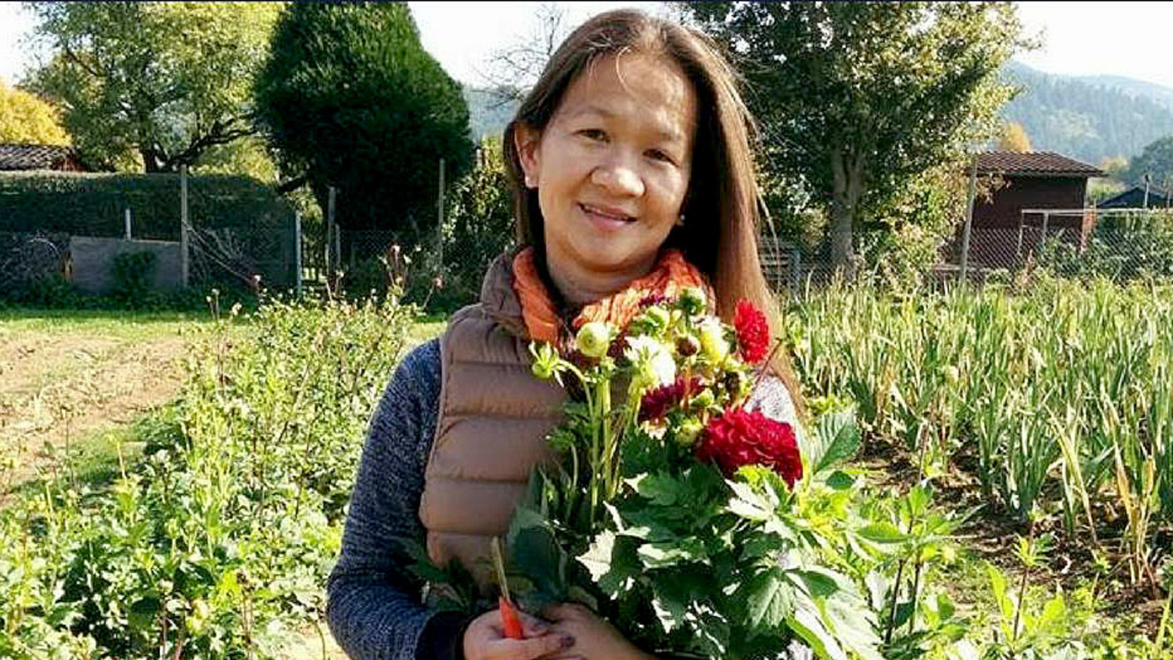 Trinh Huynh was shot and killed April 3 as she crossed Peachtree Street in Midtown. (Family photo)