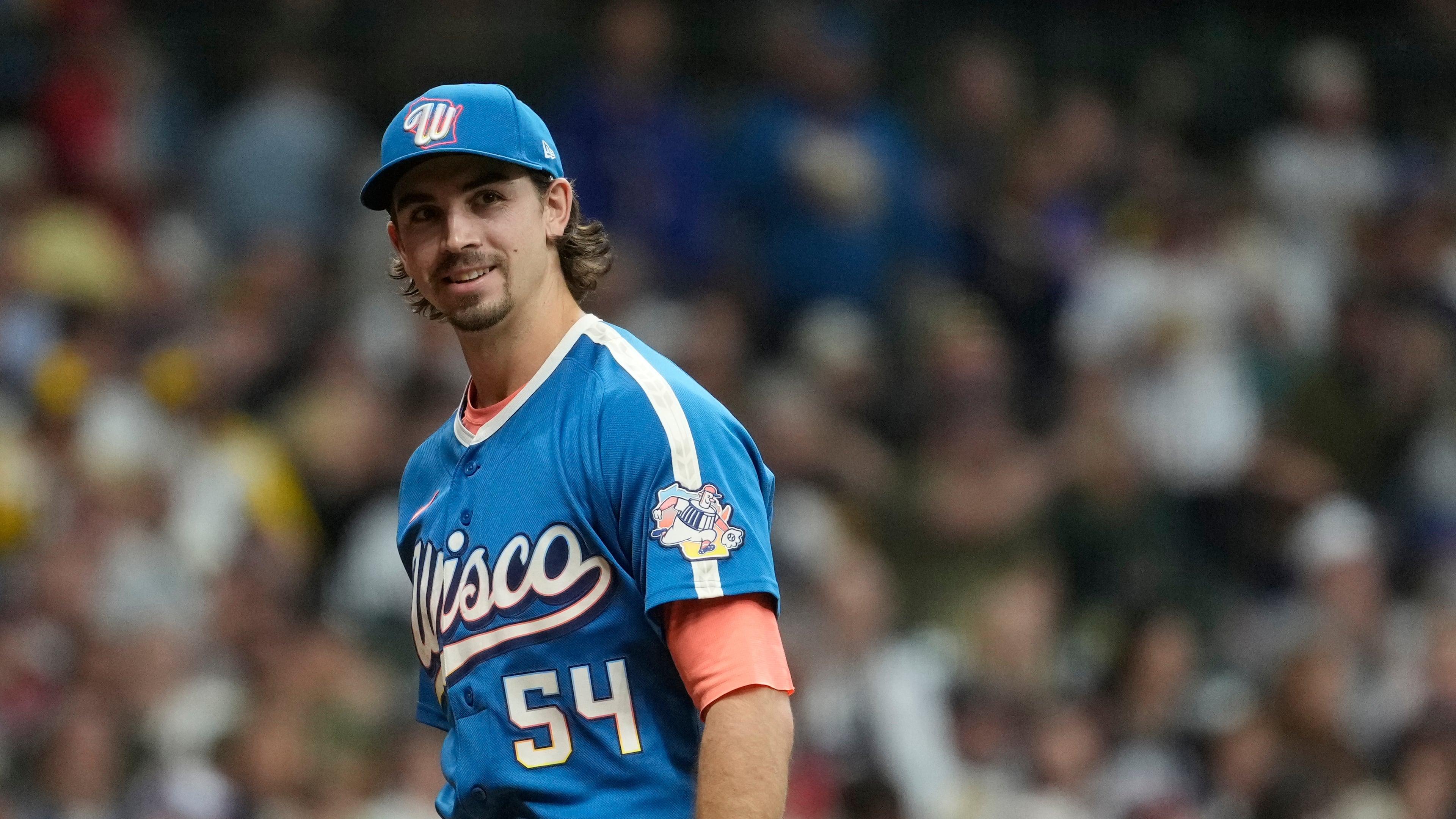 Milwaukee Brewers' Robert Gasser smiles as he walks to the dugout during the second inning of a baseball game against the St. Louis Cardinals, Friday, Sept. 25, 2026, in Milwaukee. (AP Photo/Aaron Gash)