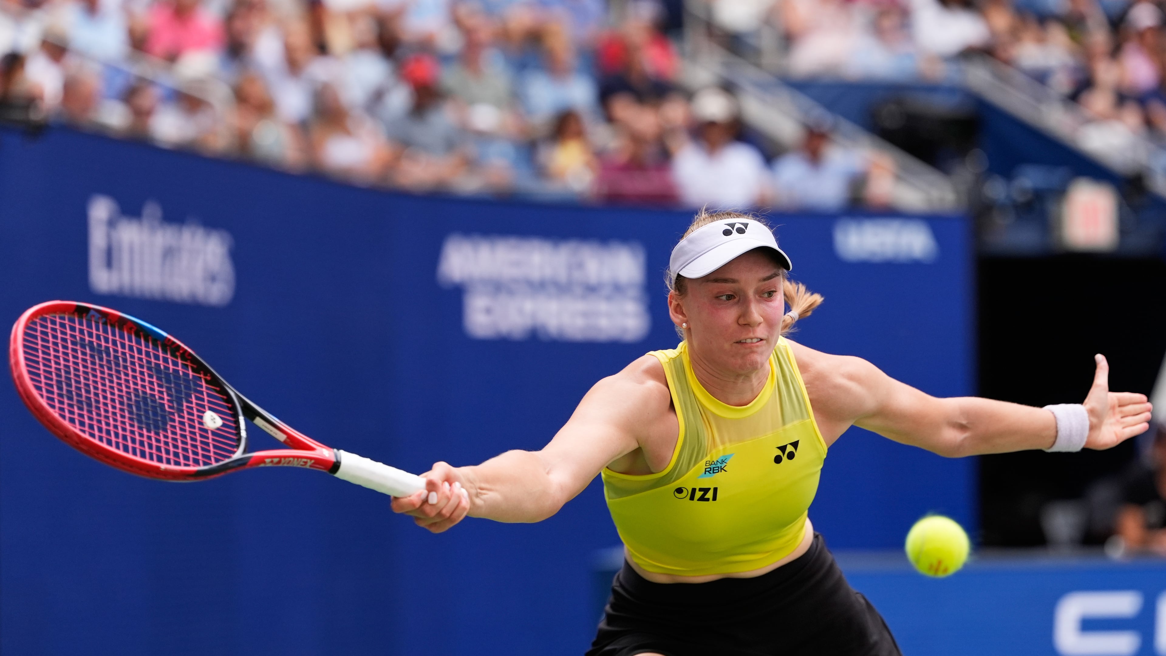 Qinwen Zheng, of China, returns the ball to Elena Rybakina, of Kazakhstan, during the quarterfinal round of the U.S. Open tennis championships, Wednesday, Sept. 9, 2026, in New York. (AP Photo/Seth Wenig)