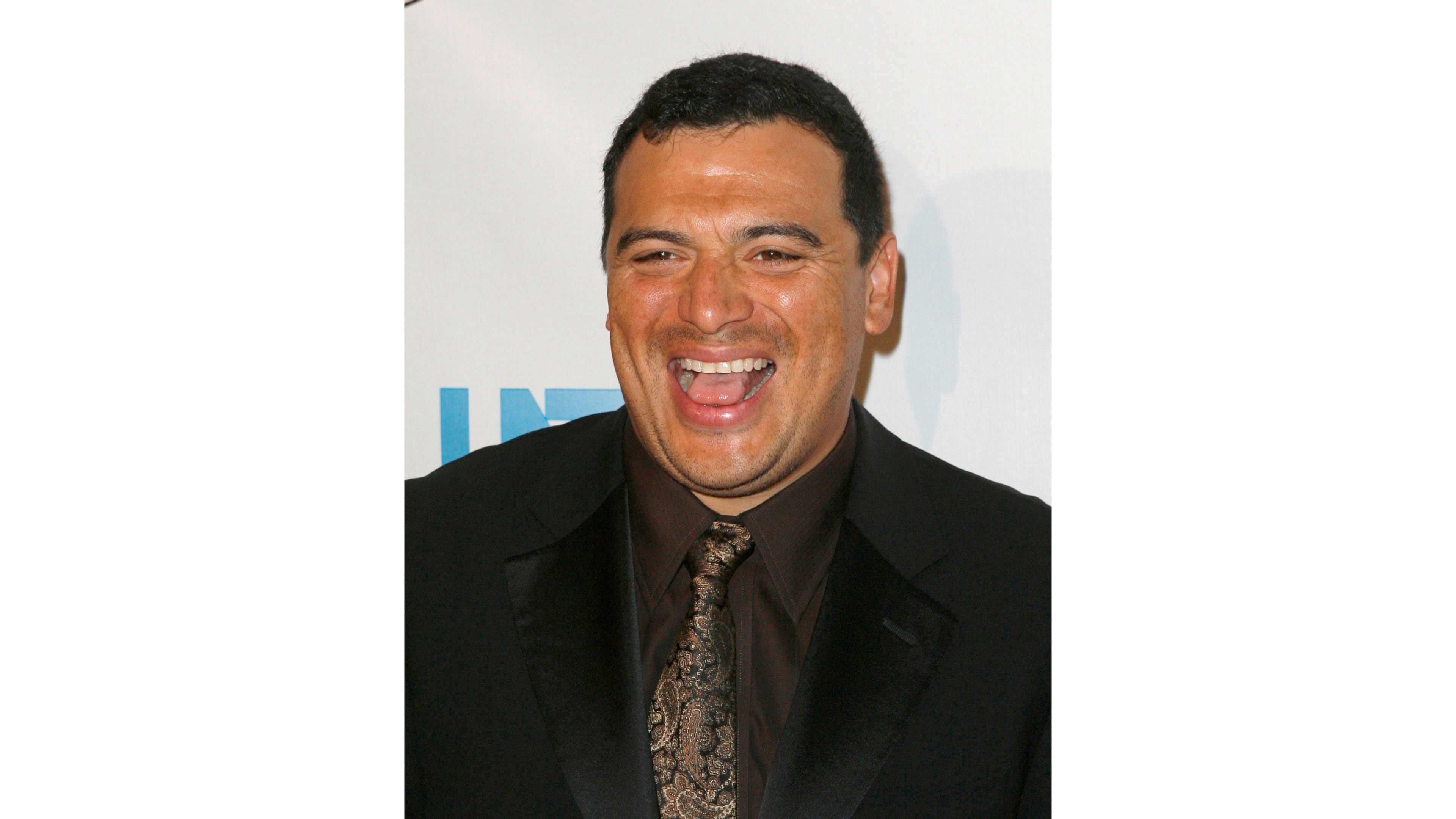 FILE - Actor and comedian Carlos Mencia arrives at the 23rd Annual Imagen Awards, Aug. 21, 2008, in Beverly Hills, Calif. (AP Photo/Gus Ruelas, File)