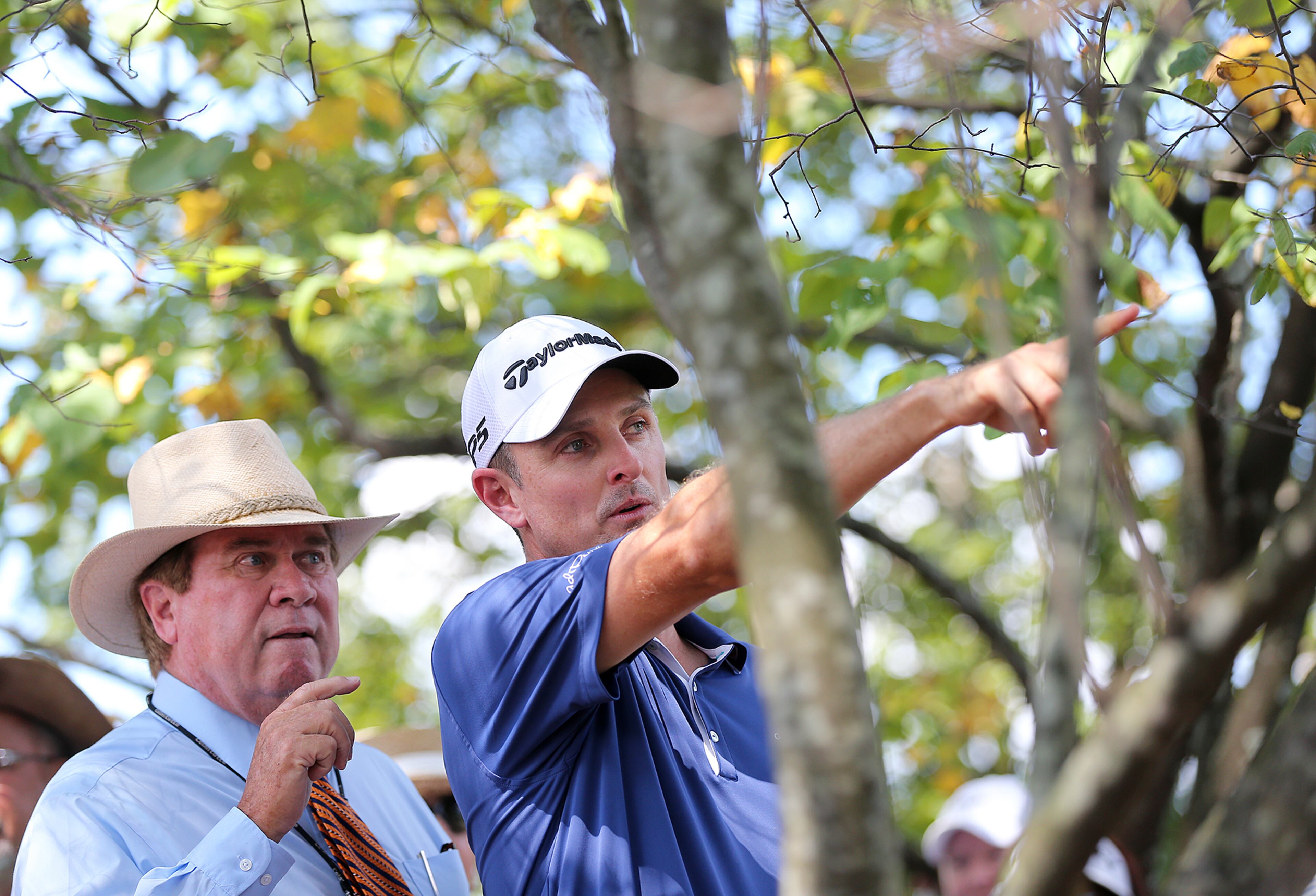 September 21, 2017 Atlanta: Justin Rose gets a ruling from an official after hitting his drive into the woods on the first hole in the opening round of the Tour Championship on Thursday, September 21, 2017, at East Lake Golf Club in Atlanta. Curtis Compton/ccompton@ajc.com