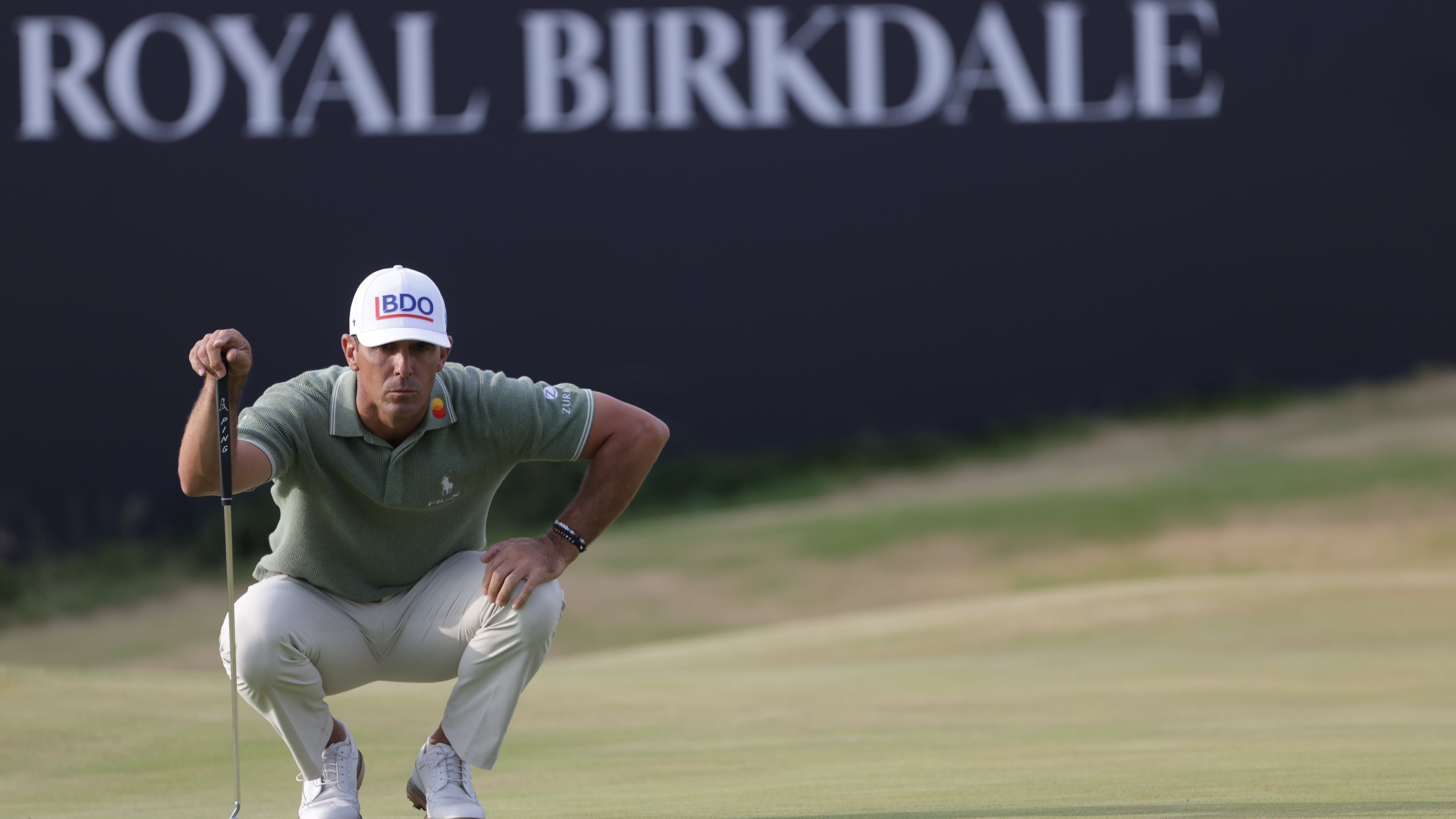 FILE - Billy Horschel of the United States looks at the lie of his putt on the 18th green during the first day of the British Open Golf championships at Royal Birkdale golf club, in Southport, England, Thursday, July 16, 2026. (AP Photo/Peter Morrison, File)