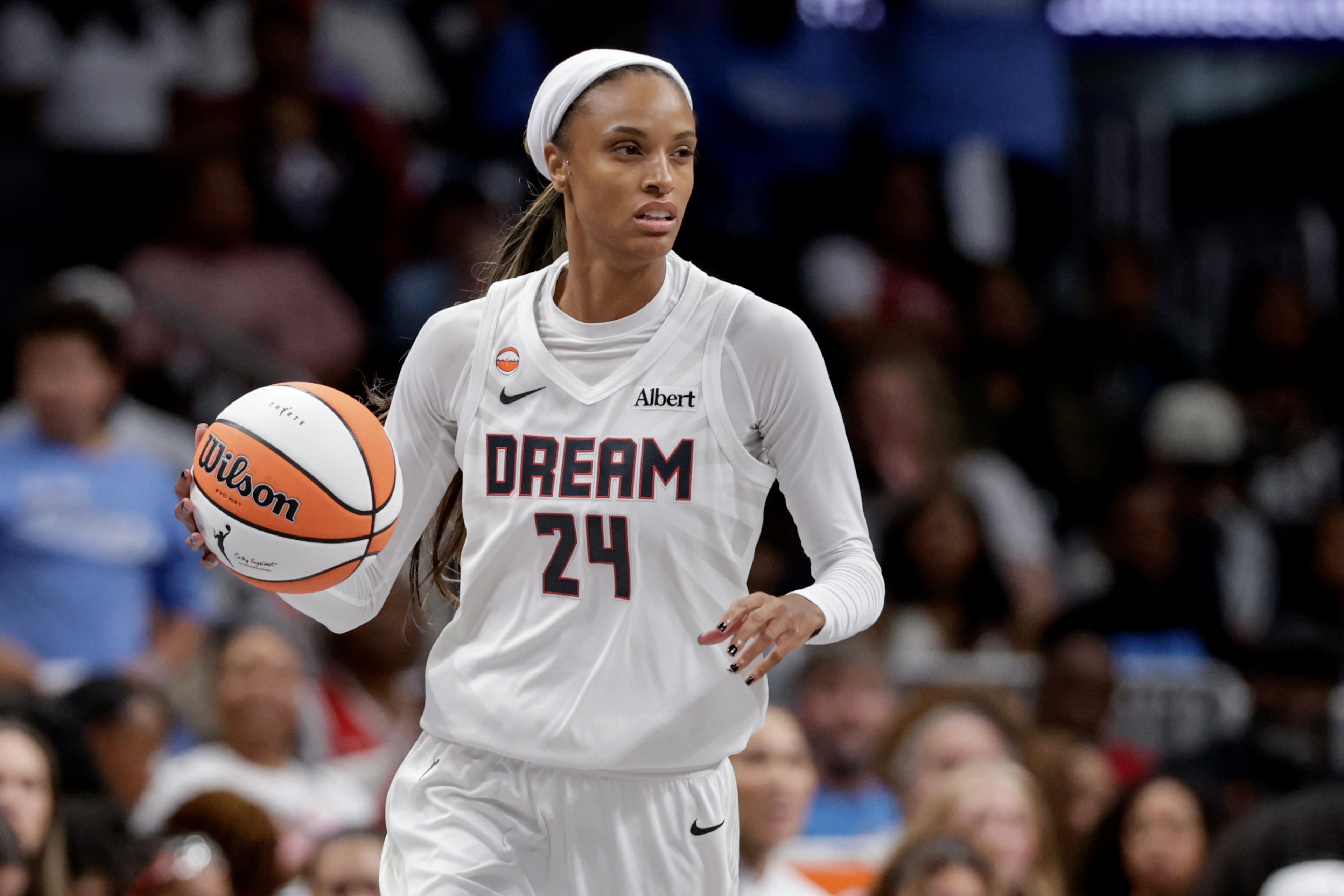 Atlanta Dream forward DeWanna Bonner (24) dribbles down the court during a WNBA semifinal playoff game. (Erik S. Lesser for the AJC)