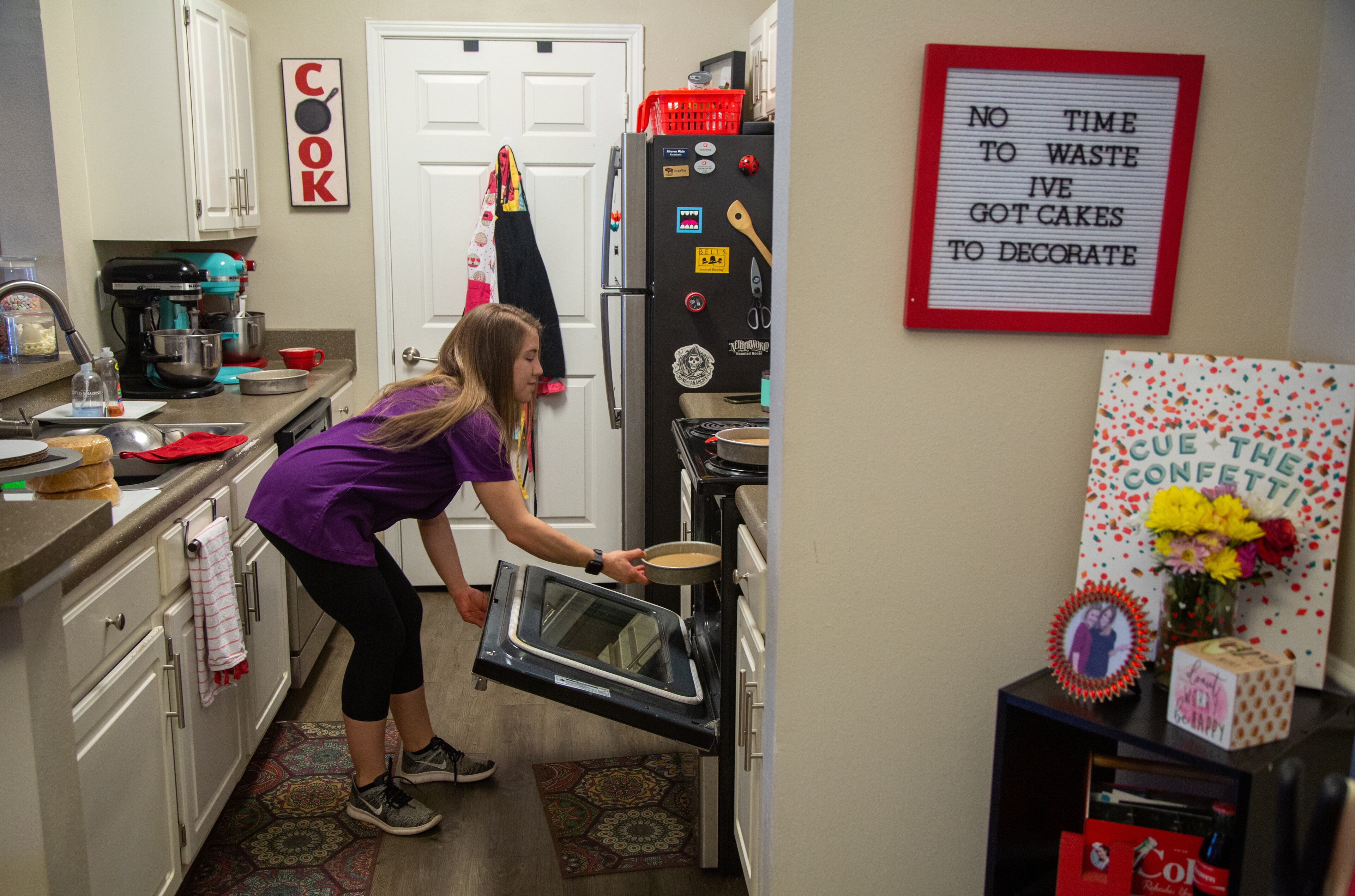 Heaven Waits of Heavenly Bakes works in the kitchen of her Buford apartment. Her business was helped by The Bert Show’s “Save my small business” promotion, which gives free ads to small businesses who have been hit hard by the pandemic. PHIL SKINNER FOR THE ATLANTA JOURNAL-CONSTITUTION.